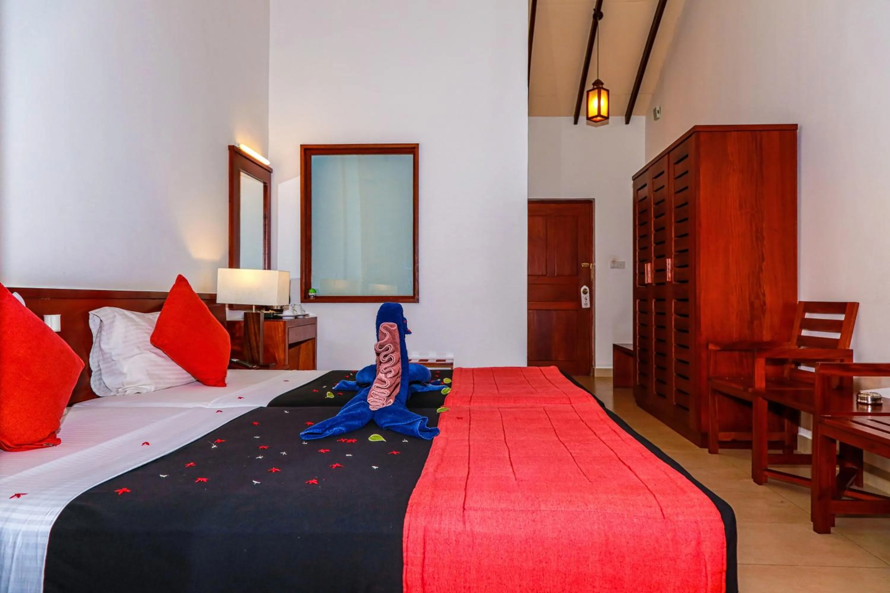Living room, Bed in Pelwehera Village Resort