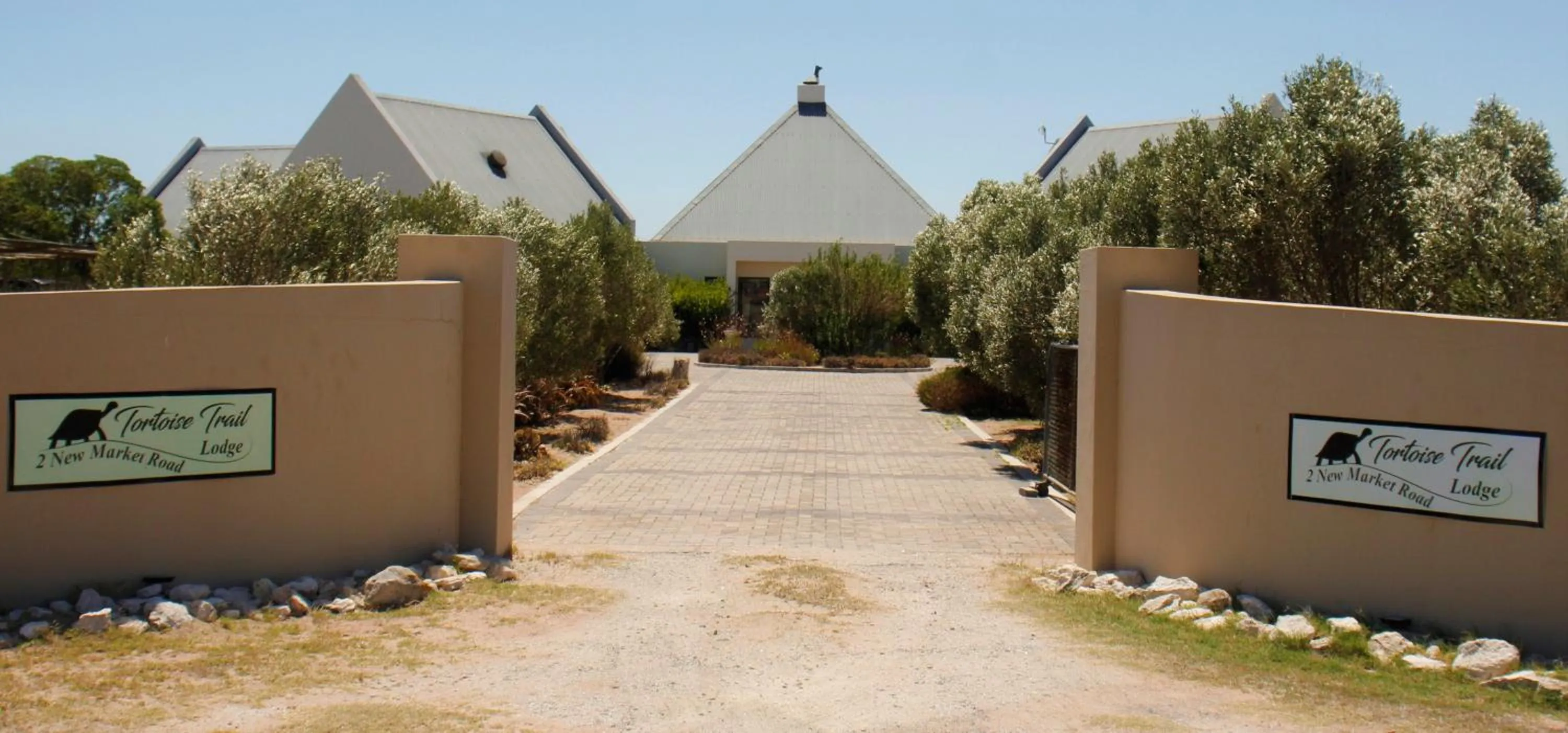 Property logo or sign in Tortoise Trail Lodge