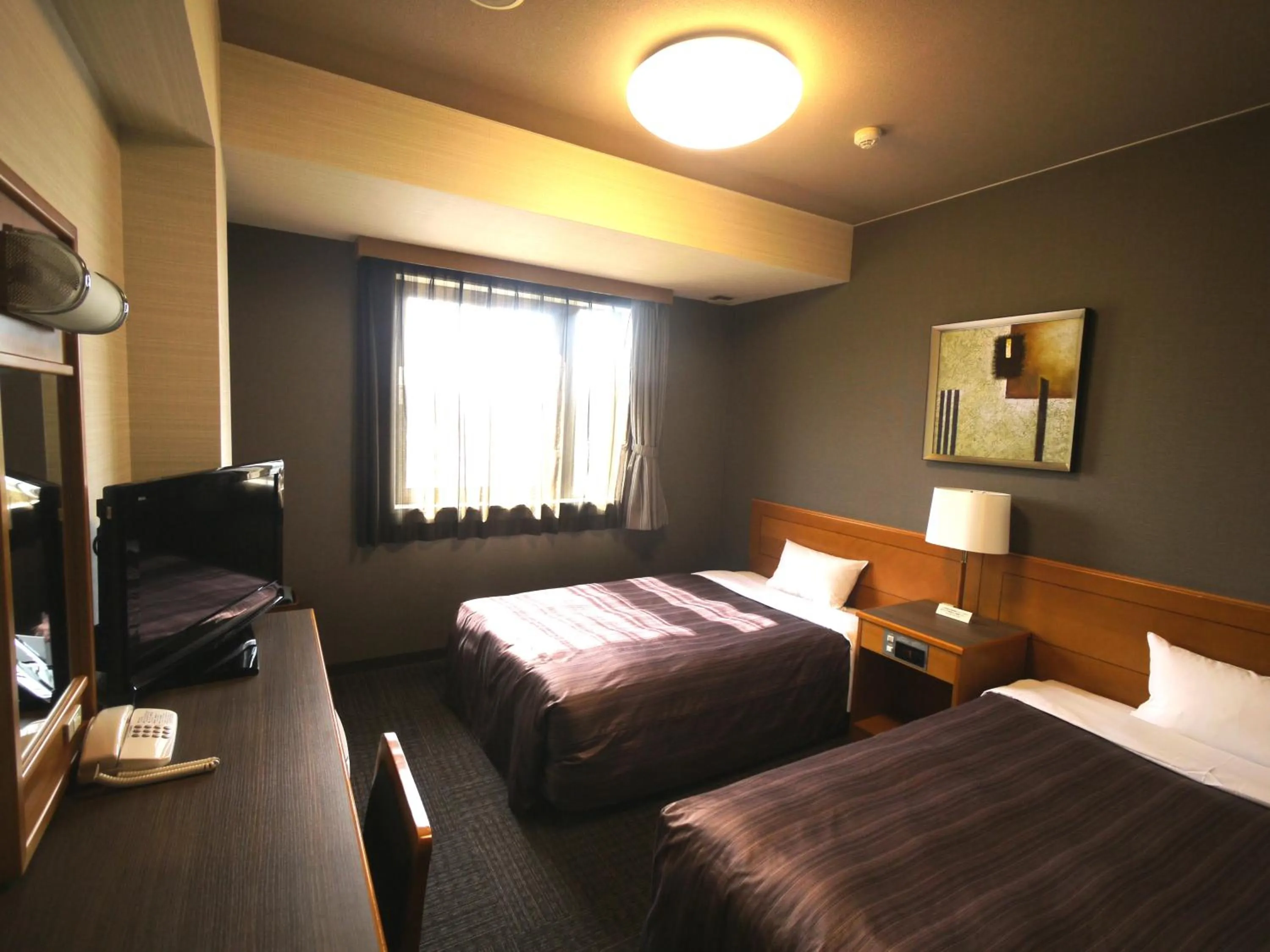 Bed in Hotel Route-Inn Nakatsugawa Inter