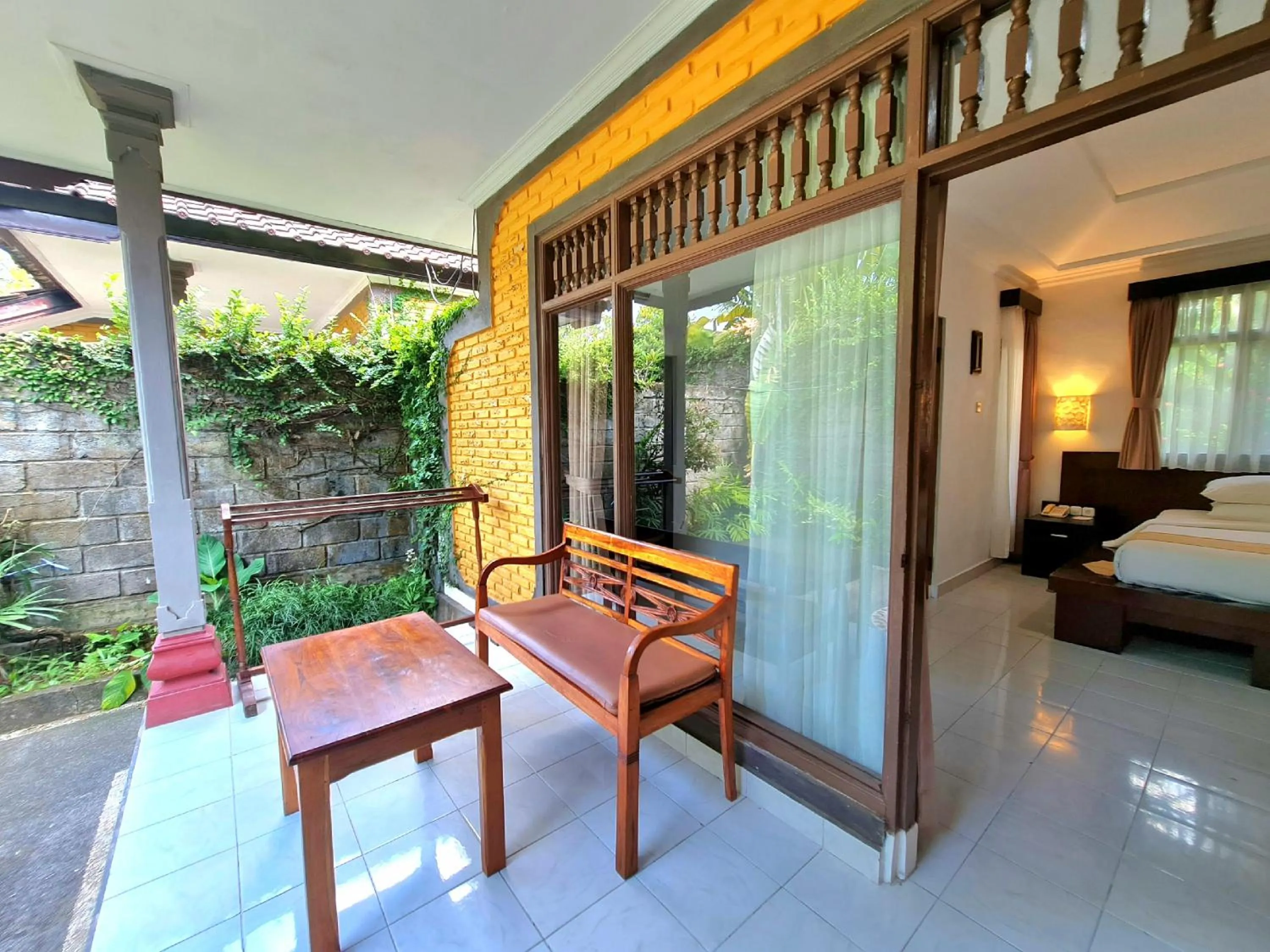Balcony/Terrace, Bed in Satriya Cottages