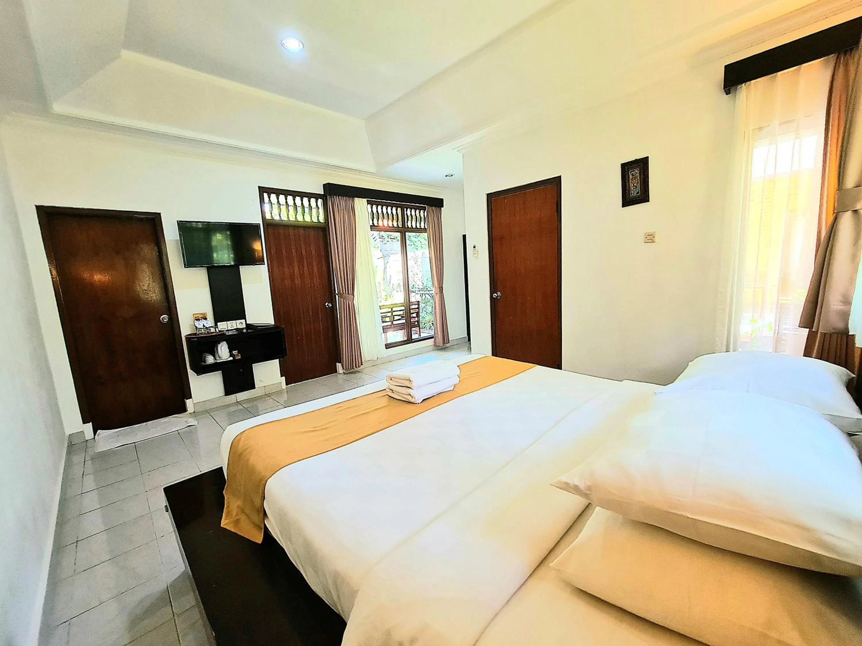 Bedroom, Bed in Satriya Cottages