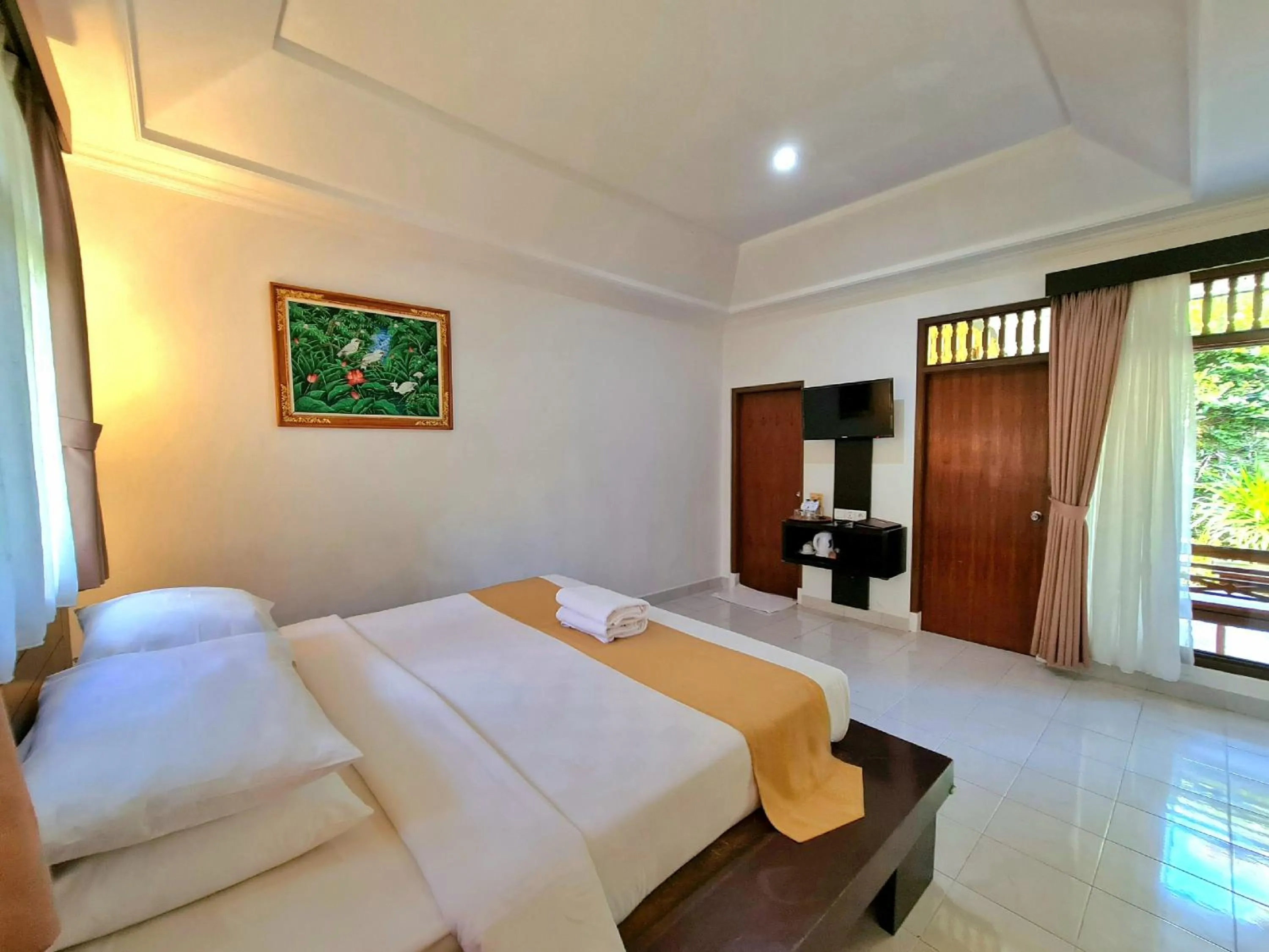 Bedroom, Bed in Satriya Cottages
