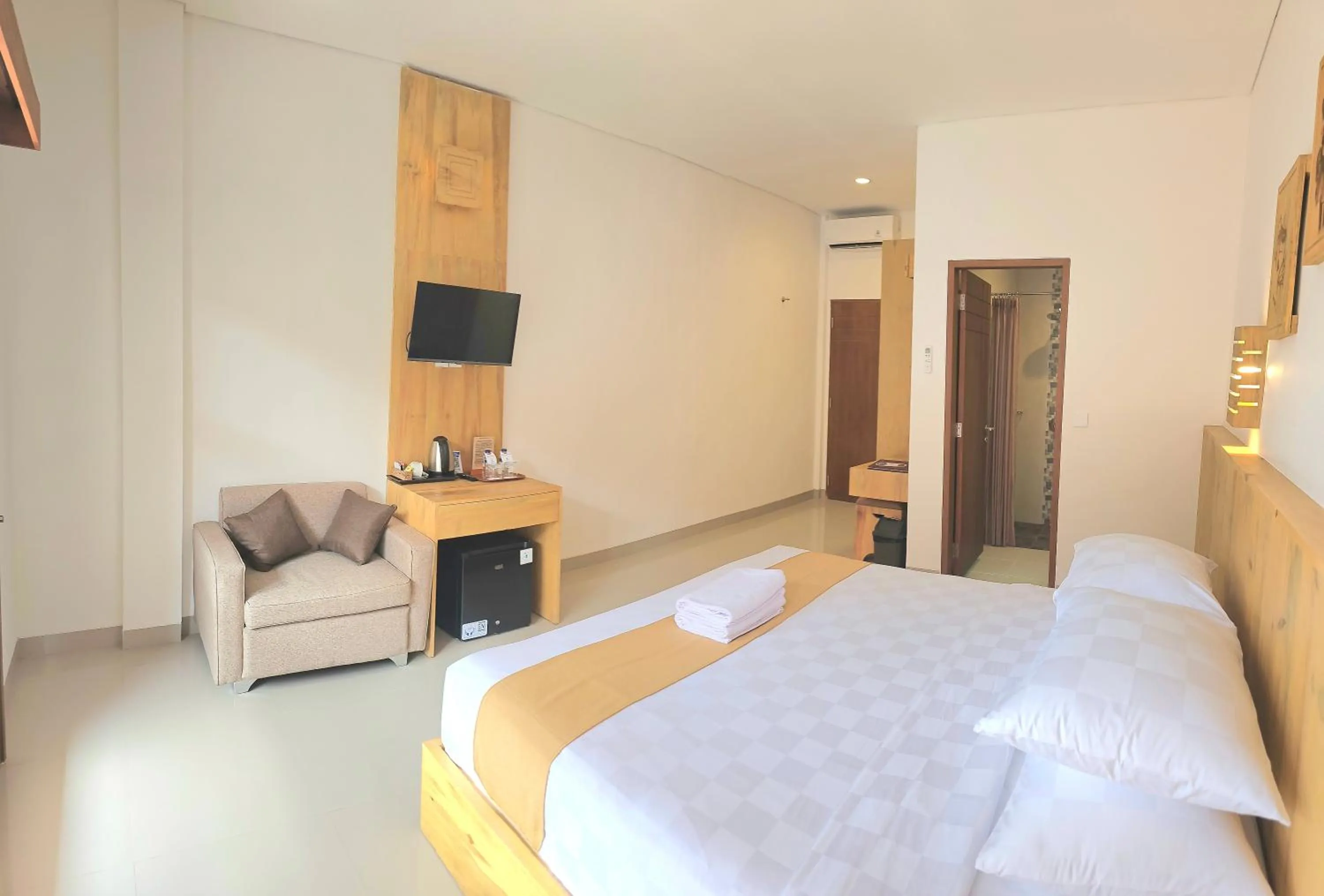 TV and multimedia, Bed in Satriya Cottages