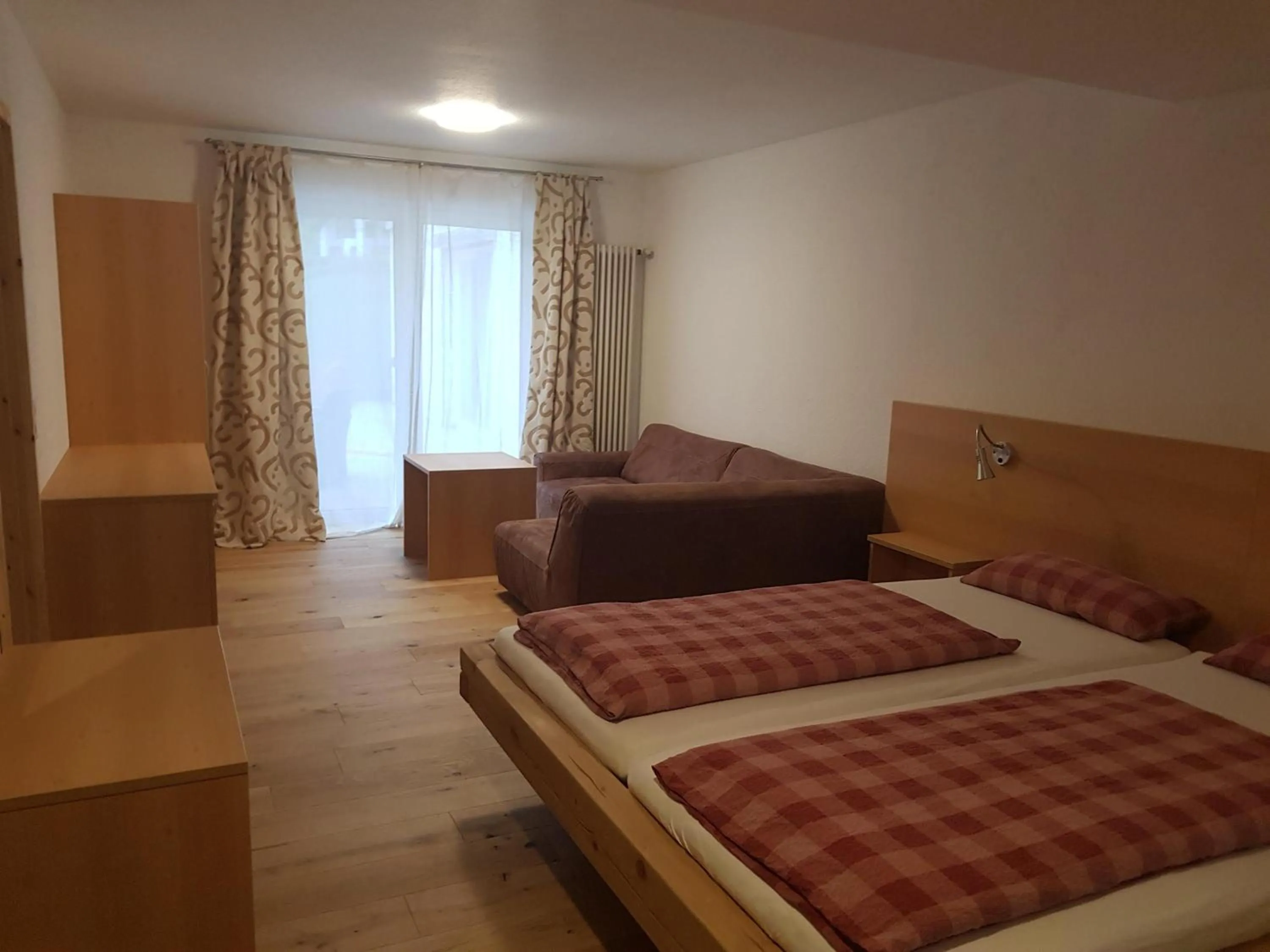 Bedroom in Naturhotel Holzwurm