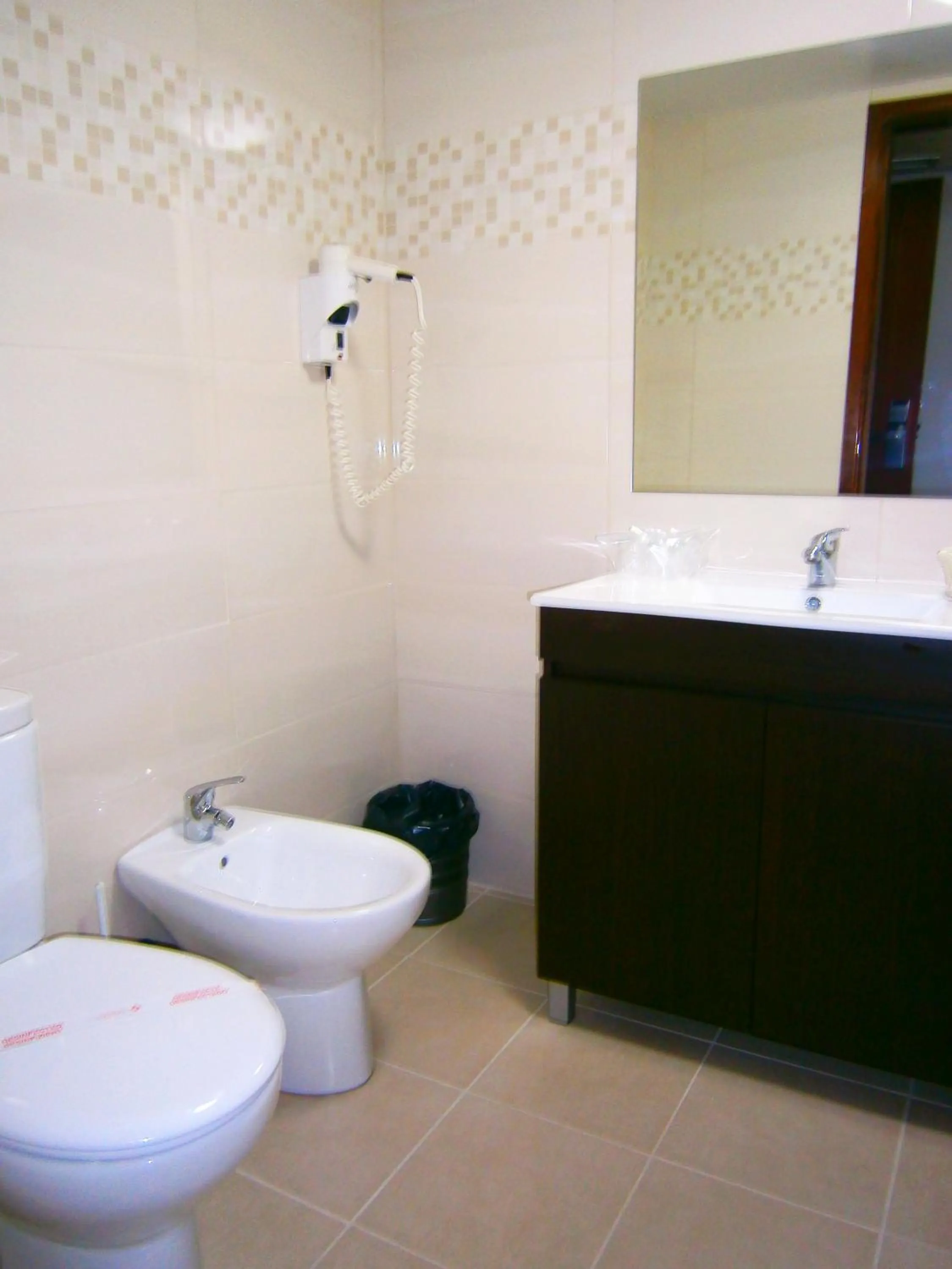 Toilet in Hotel Cristal Caldas