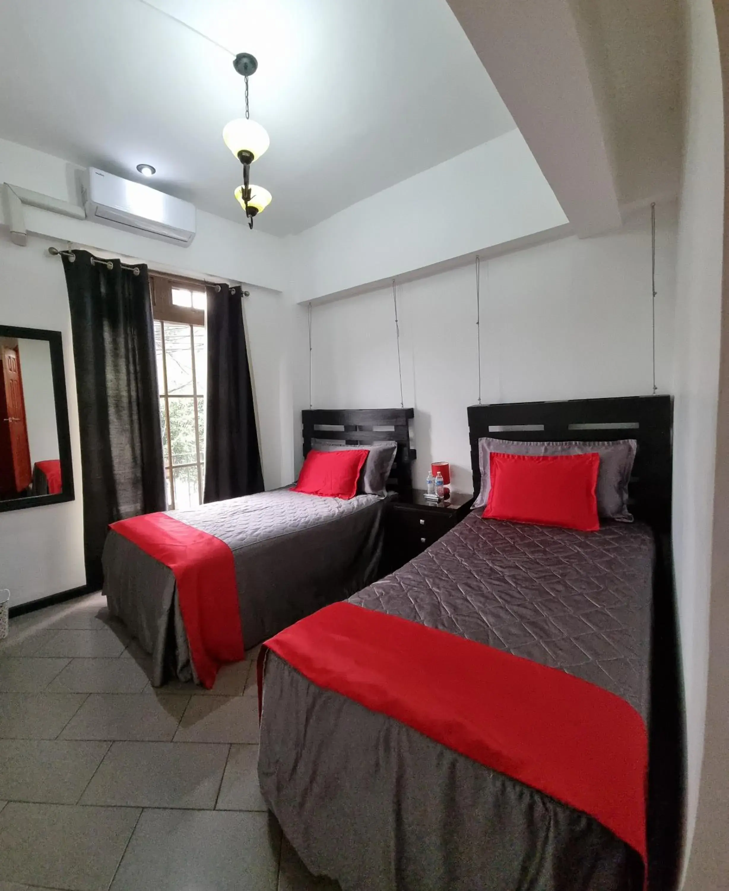 Twin Room with Private Bathroom in Cayalito Apart Hotel Twin Room with Private Bathroom in Cayalito Apart Hotel