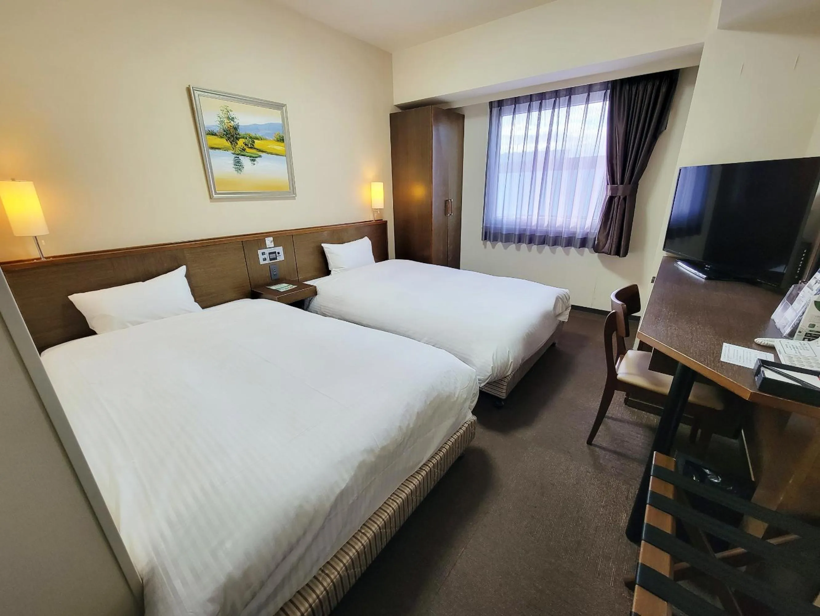 Photo of the whole room, Bed in Hotel Route-Inn Toyotajinnaka