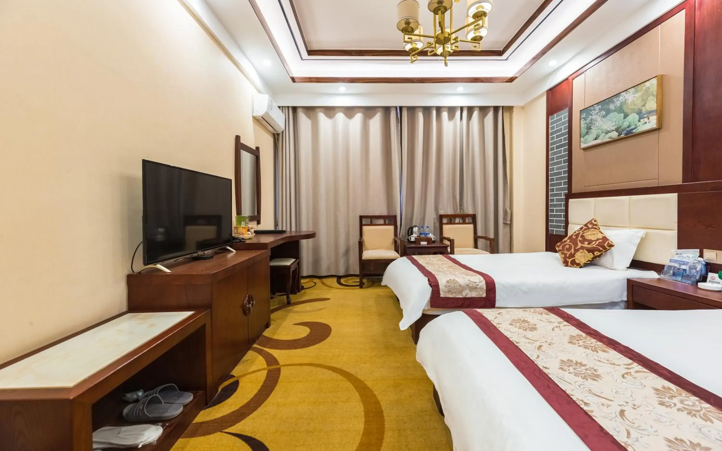 Deluxe Twin Room in Binchuan Shuang Long Hotel Deluxe Twin Room in Binchuan Shuang Long Hotel