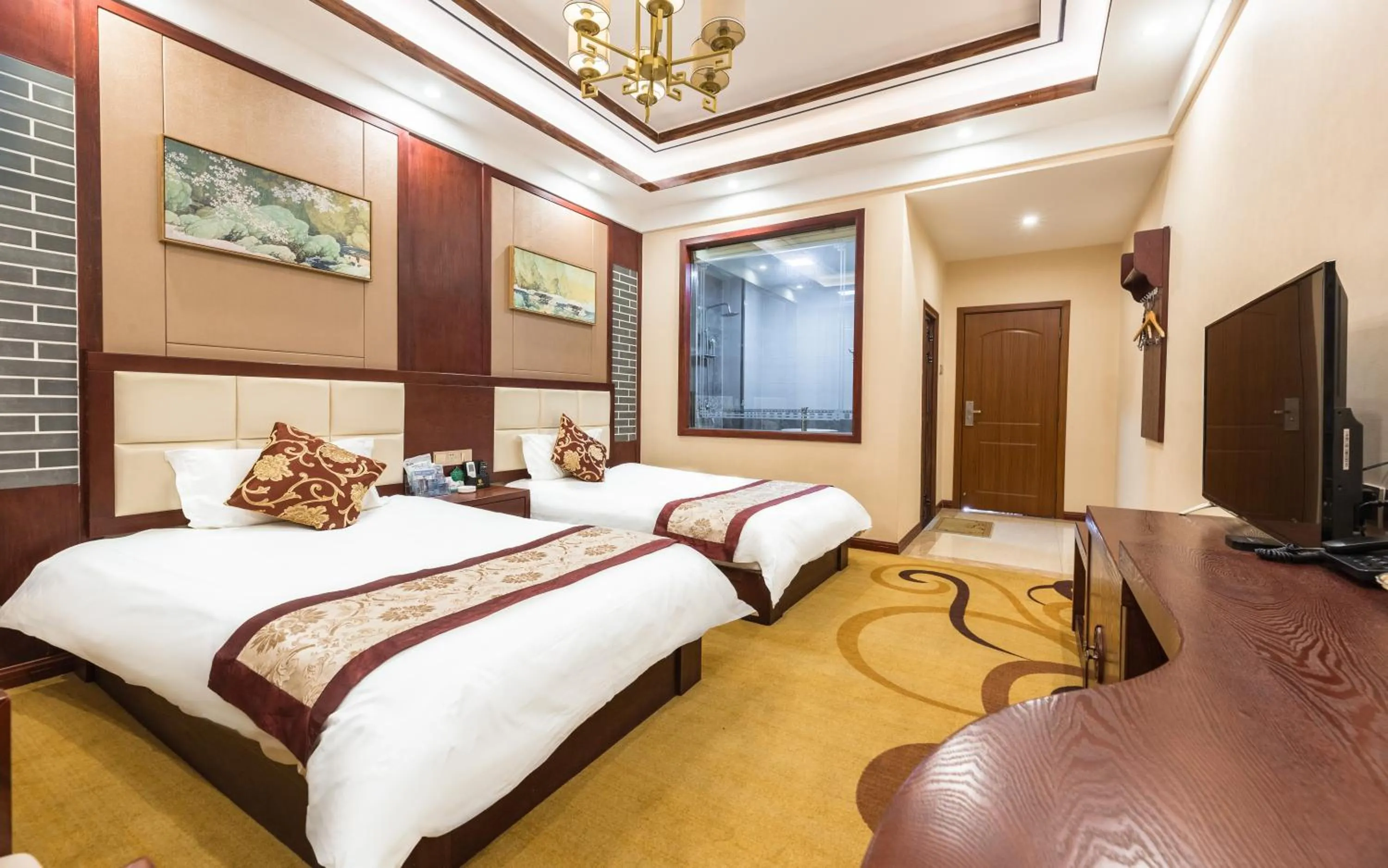 Photo of the whole room, Bed in Binchuan Shuang Long Hotel