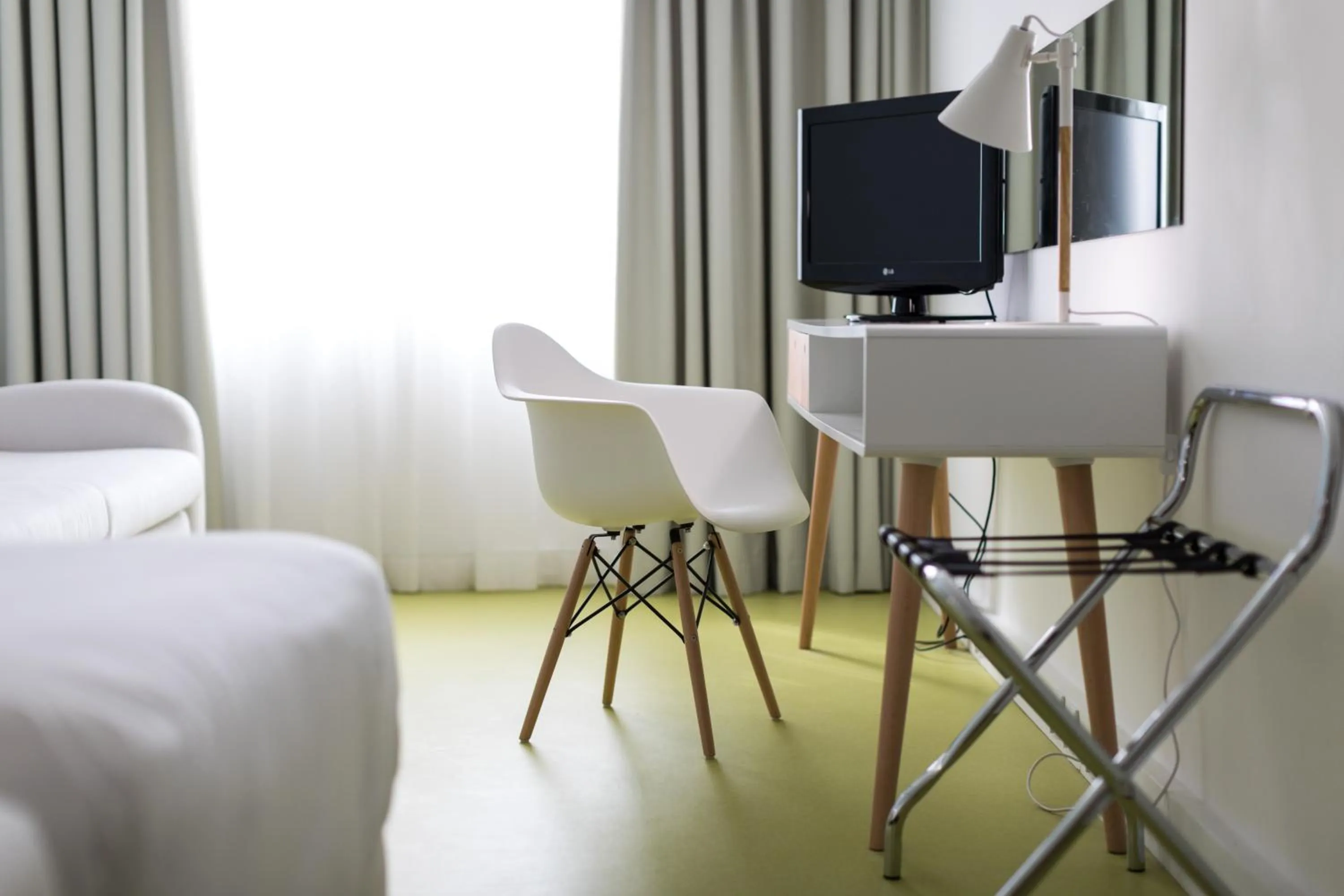 Bed in Legendary Porto Hotel