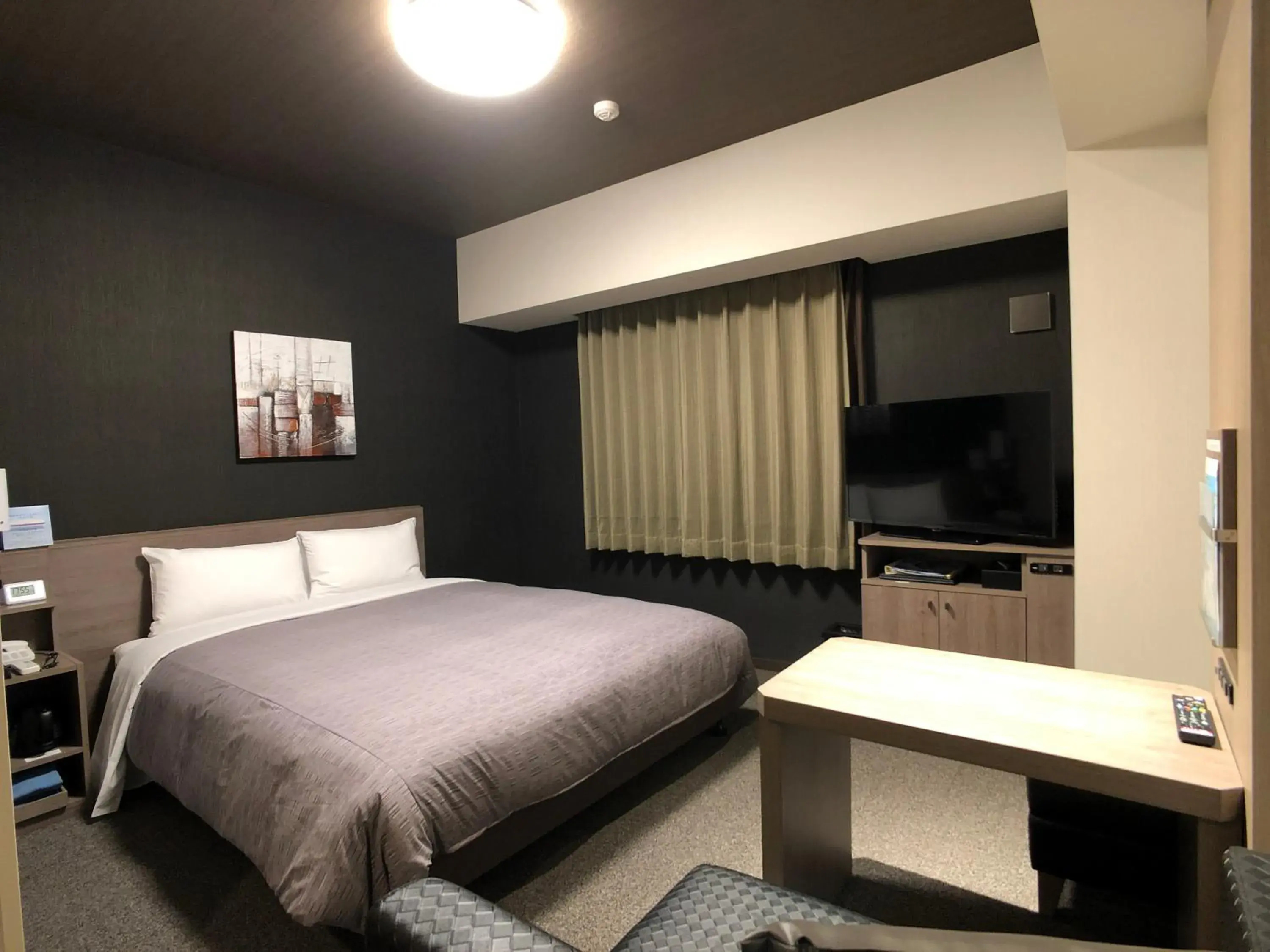 Bed in Hotel Route-Inn Tokoname Ekimae Bed in Hotel Route-Inn Tokoname Ekimae