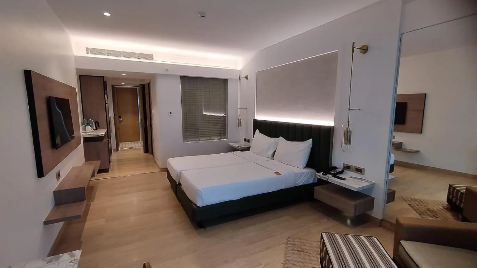 Bed in Mirage Hotel, Mumbai International Airport