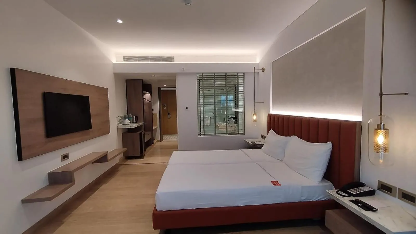 Bed in Mirage Hotel, Mumbai International Airport