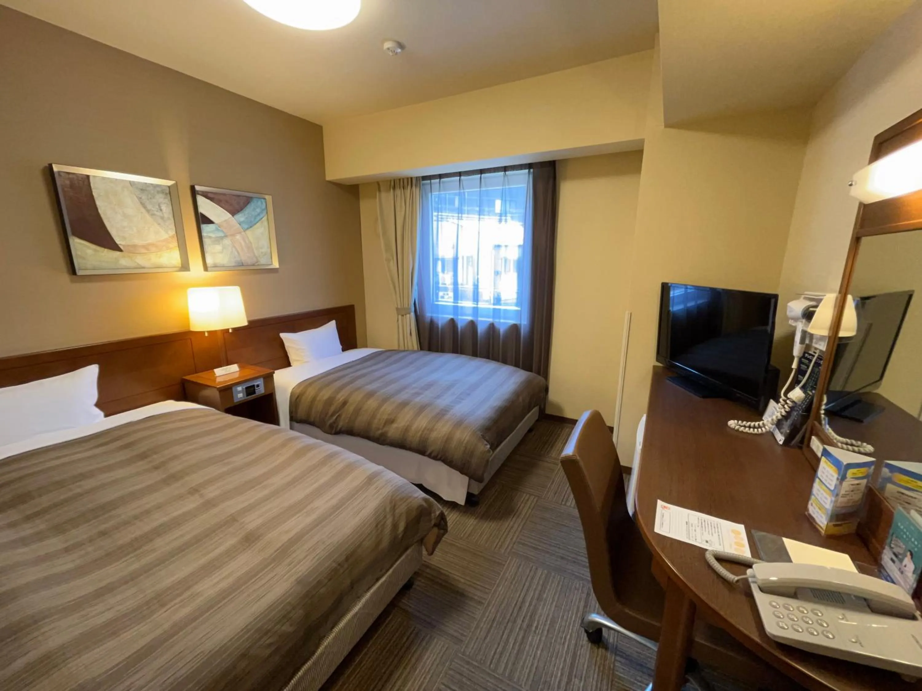 Photo of the whole room, Bed in Hotel Route-Inn Ichinomiya Ekimae
