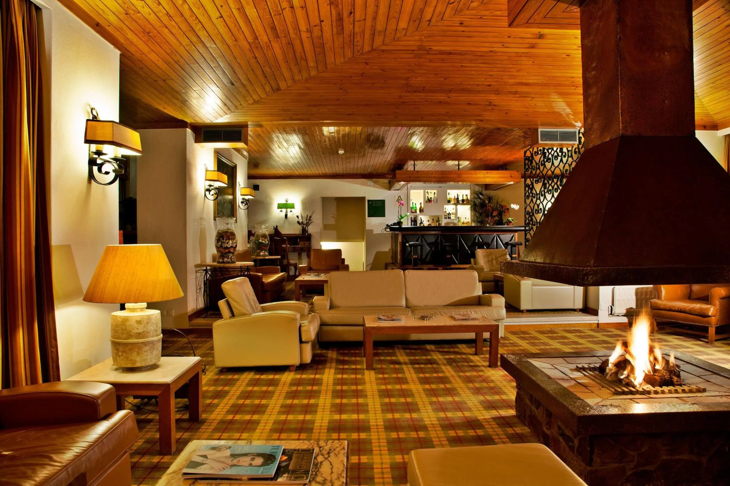 Communal lounge/ TV room in Lago Azul Eco Hotel