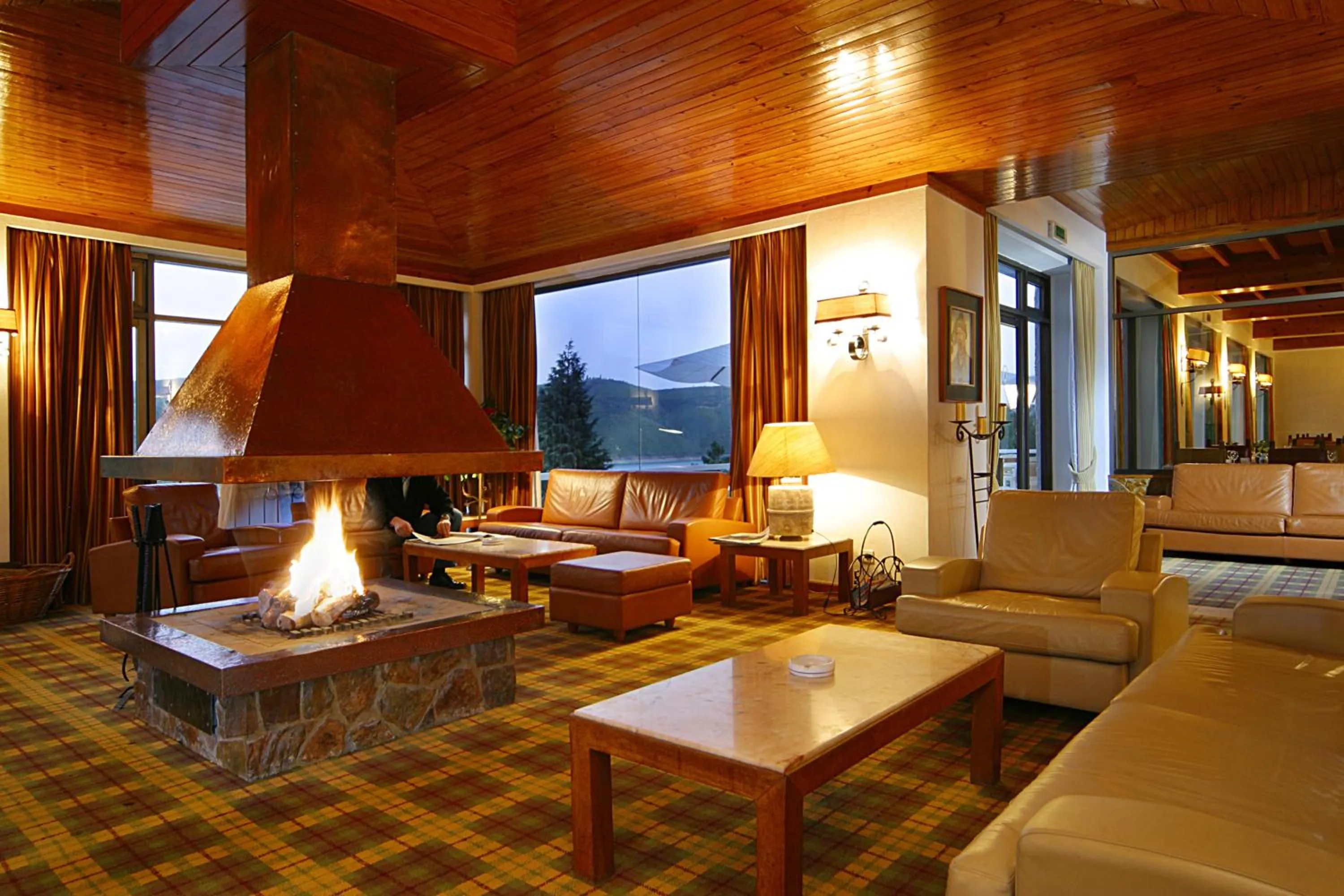 Communal lounge/ TV room in Lago Azul Eco Hotel