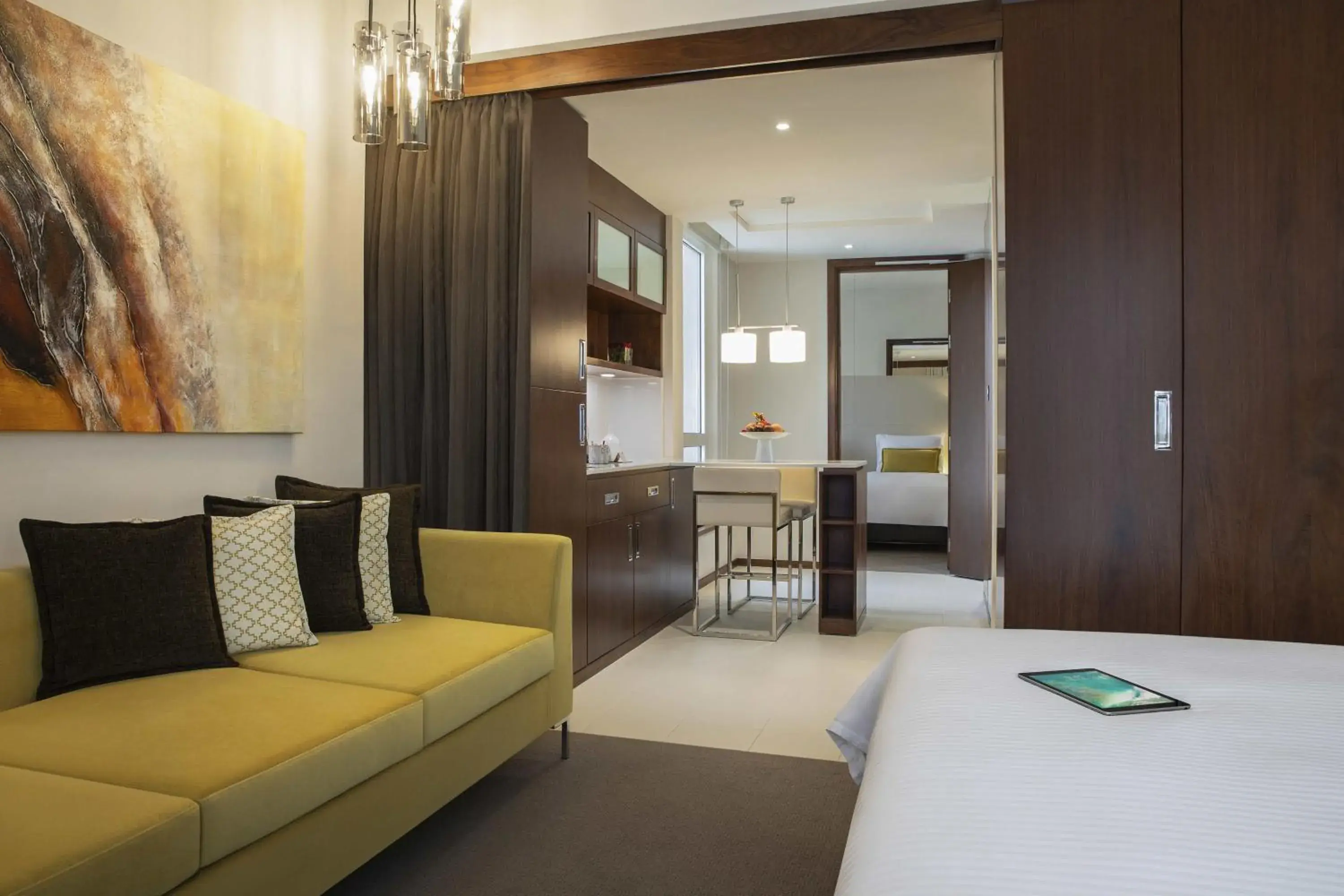 Seating area, Bed in Centro Olaya by Rotana Seating area, Bed in Centro Olaya by Rotana