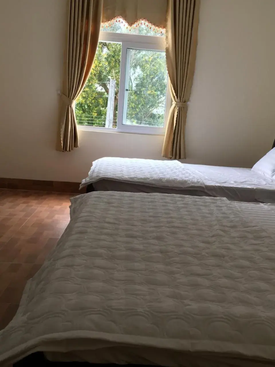 Bed in Dang Duy Hotel Bed in Dang Duy Hotel