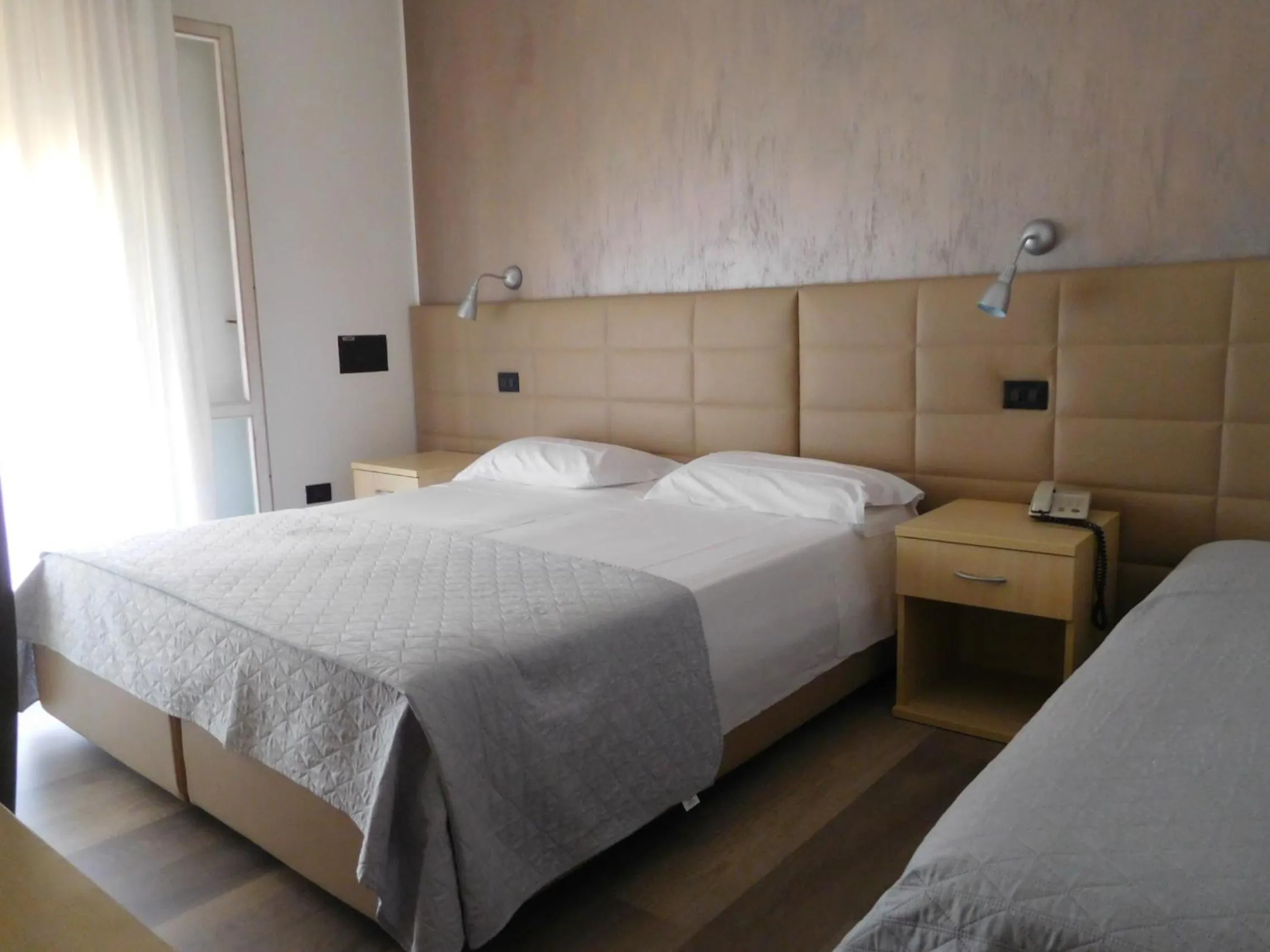 Bed in Hotel Emperador