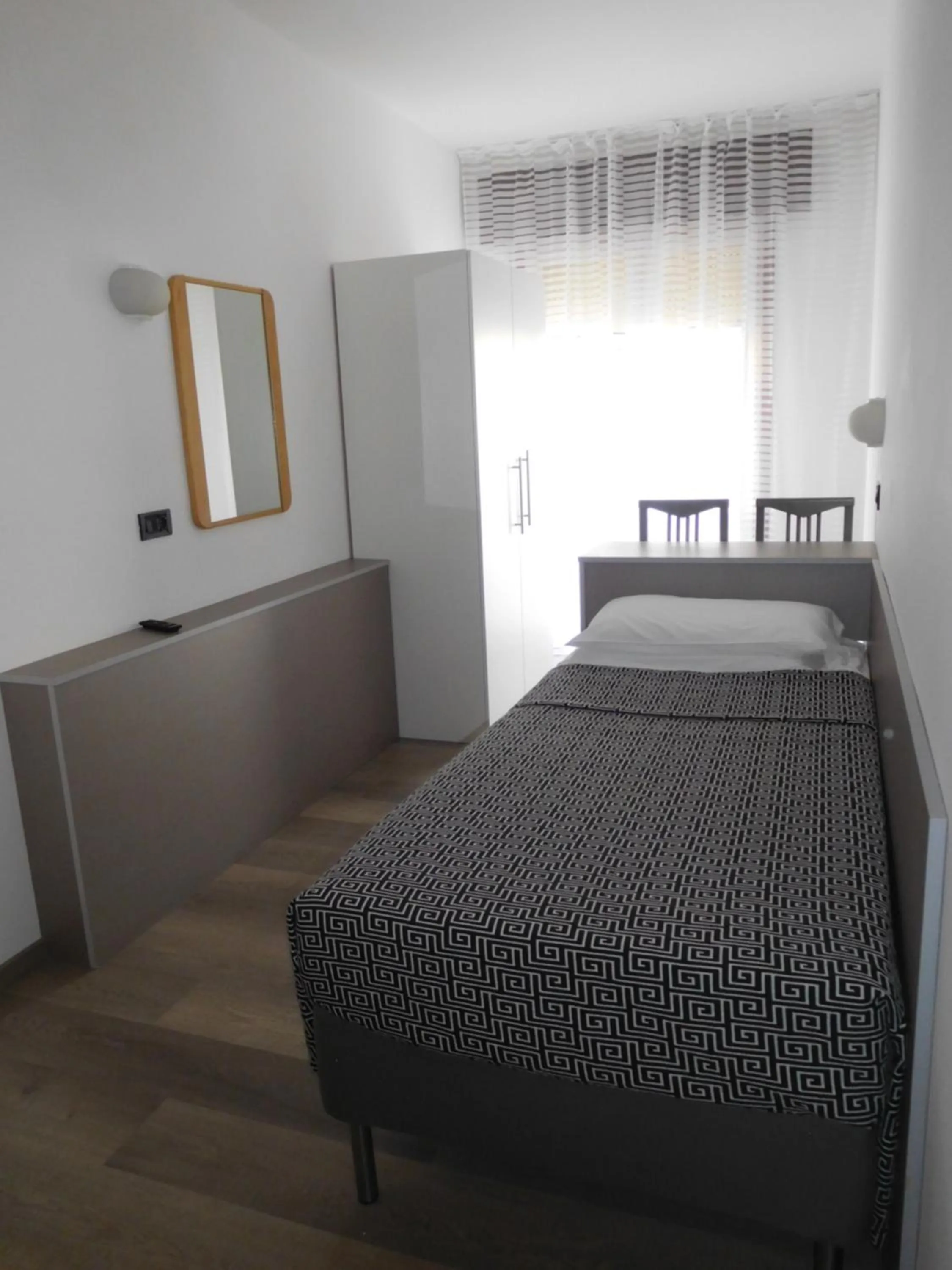 Bed in Hotel Emperador