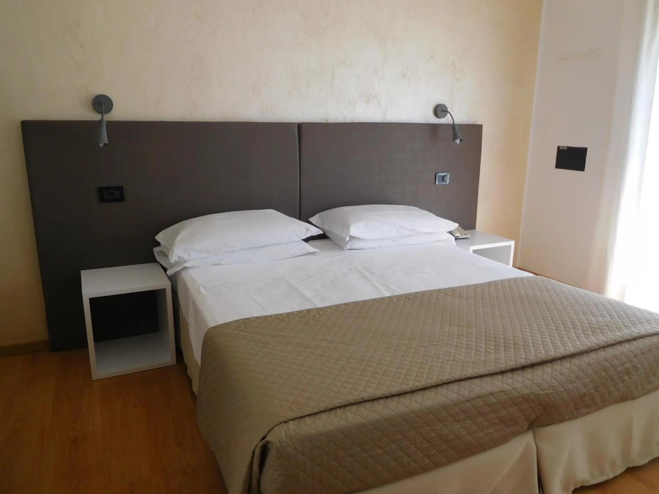 Bed in Hotel Emperador