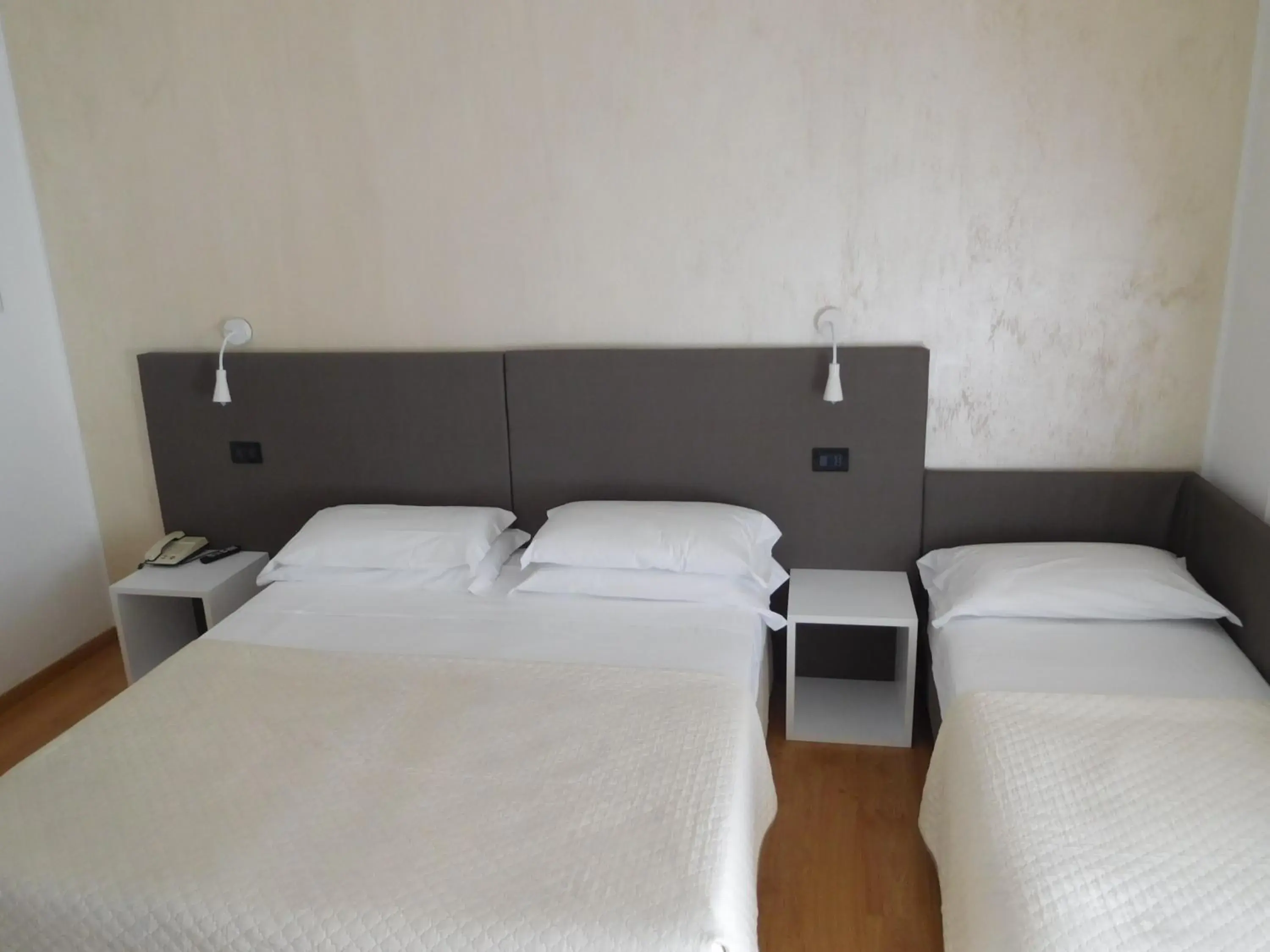 Bed in Hotel Emperador