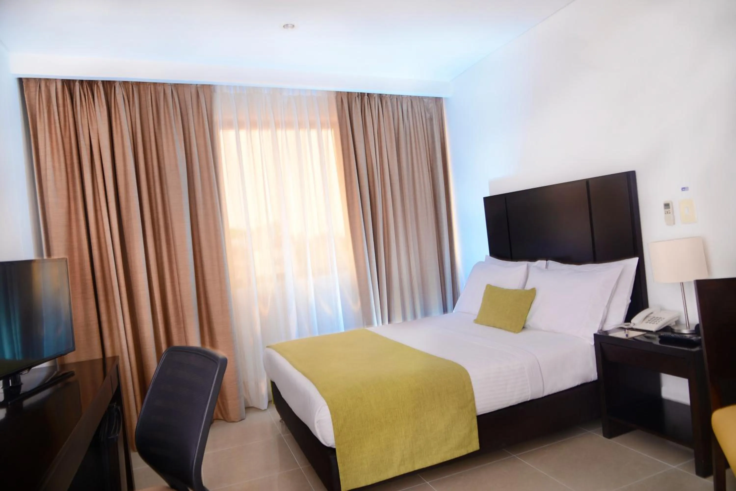 Bedroom, Bed in Hotel Millenium Barrancabermeja