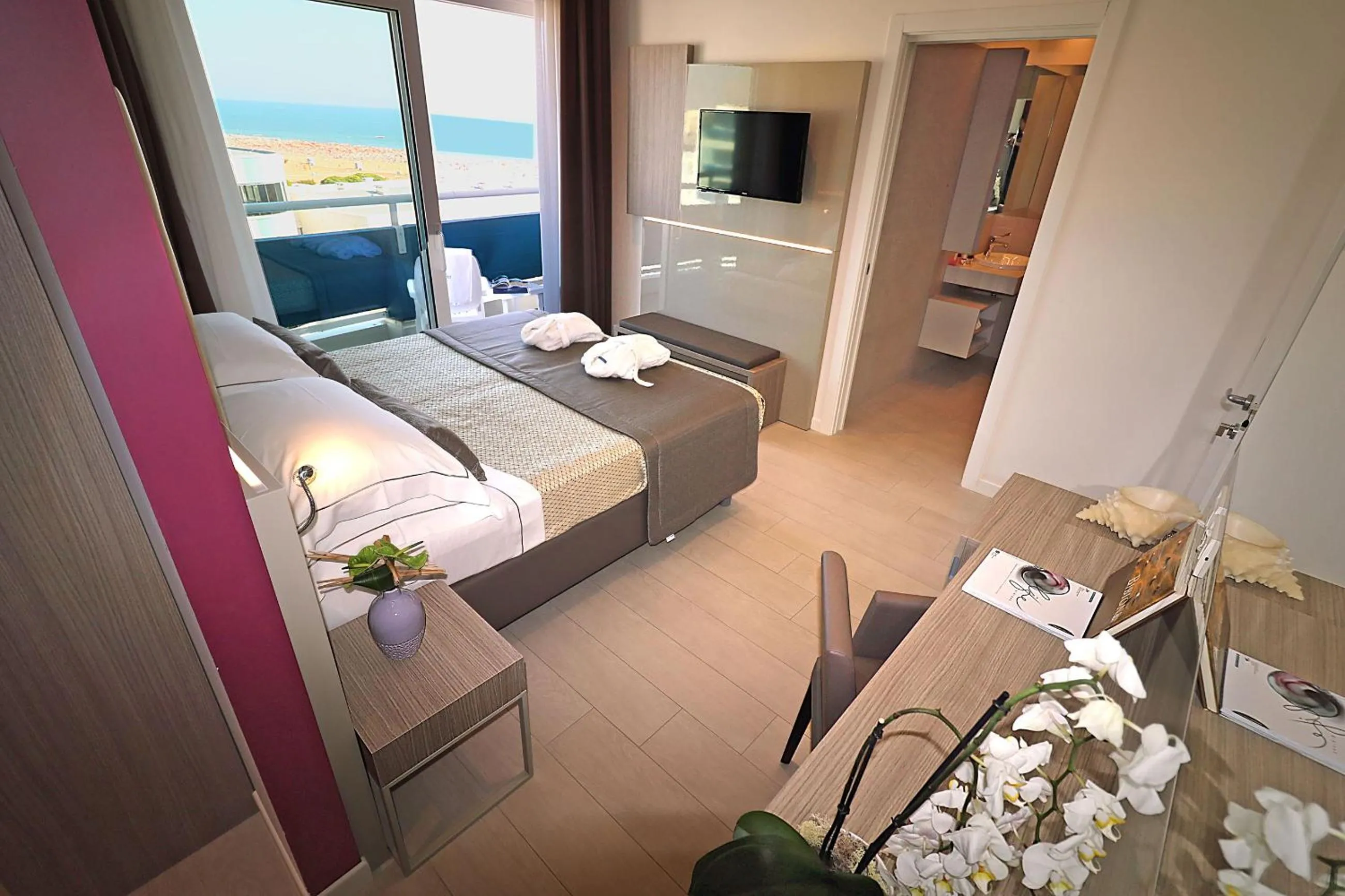 Bed in Majestic Beach Hotel & Wellness