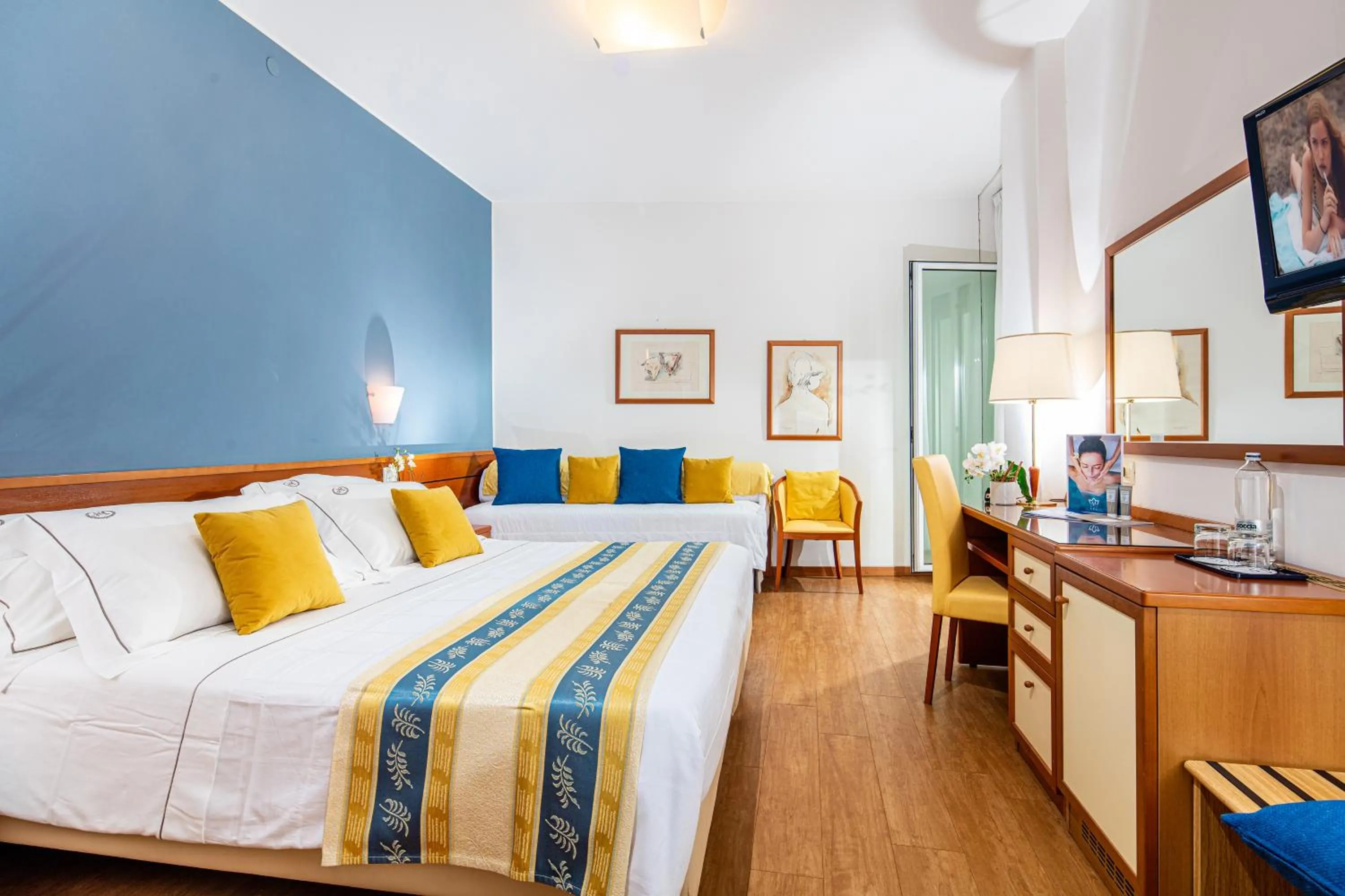Bed in Majestic Beach Hotel & Wellness