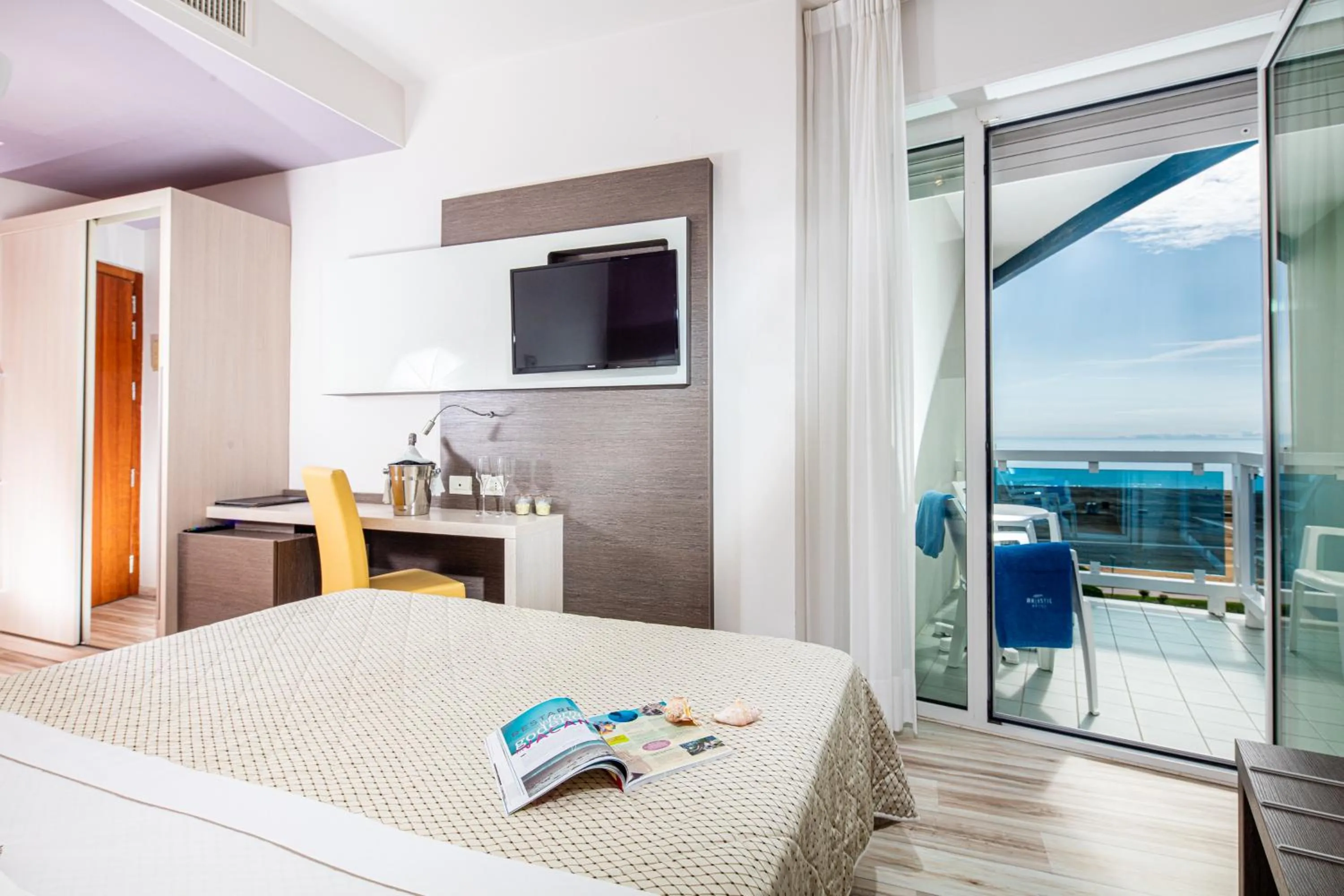 Bed in Majestic Beach Hotel & Wellness