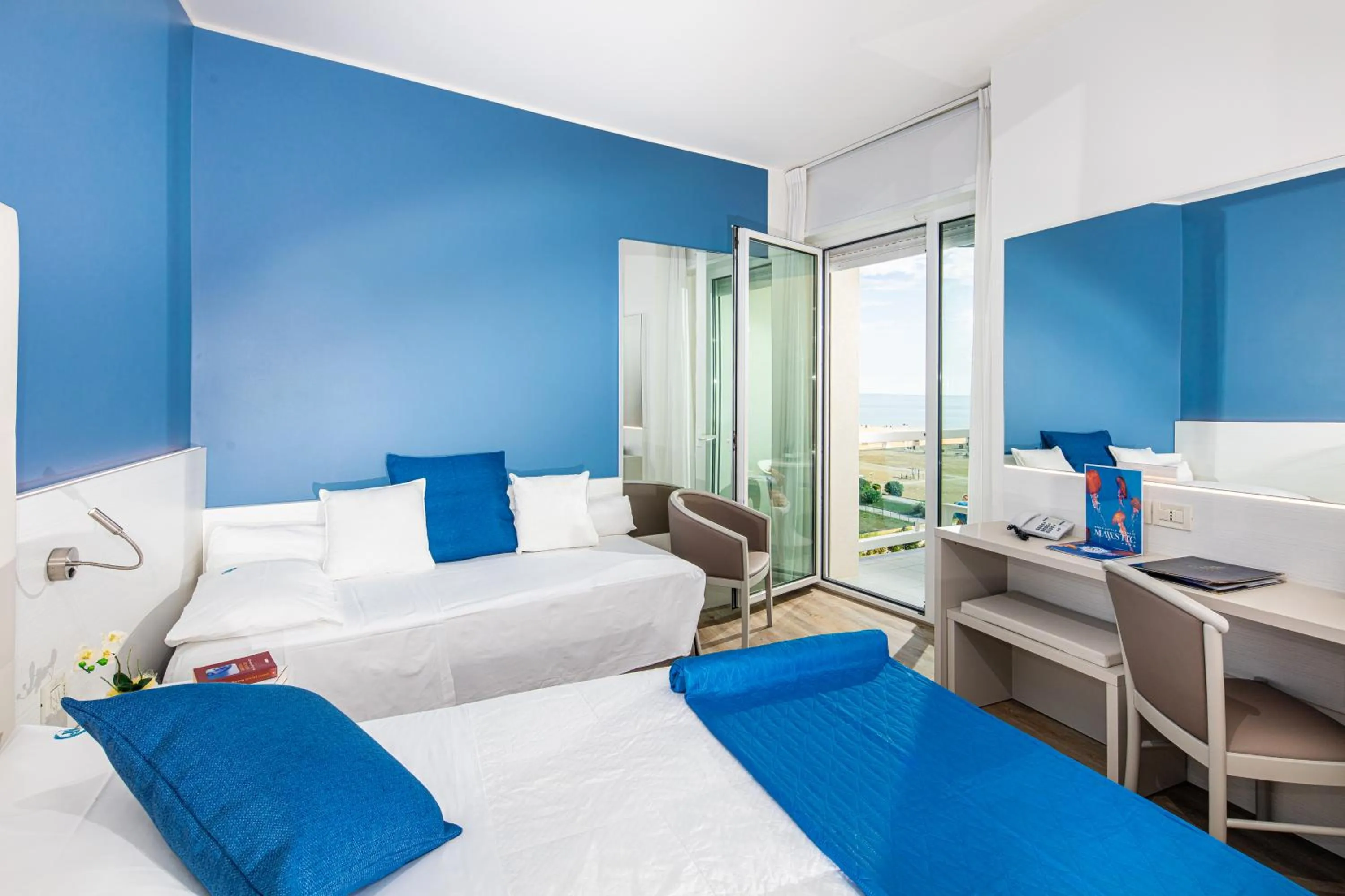 Bed in Majestic Beach Hotel & Wellness