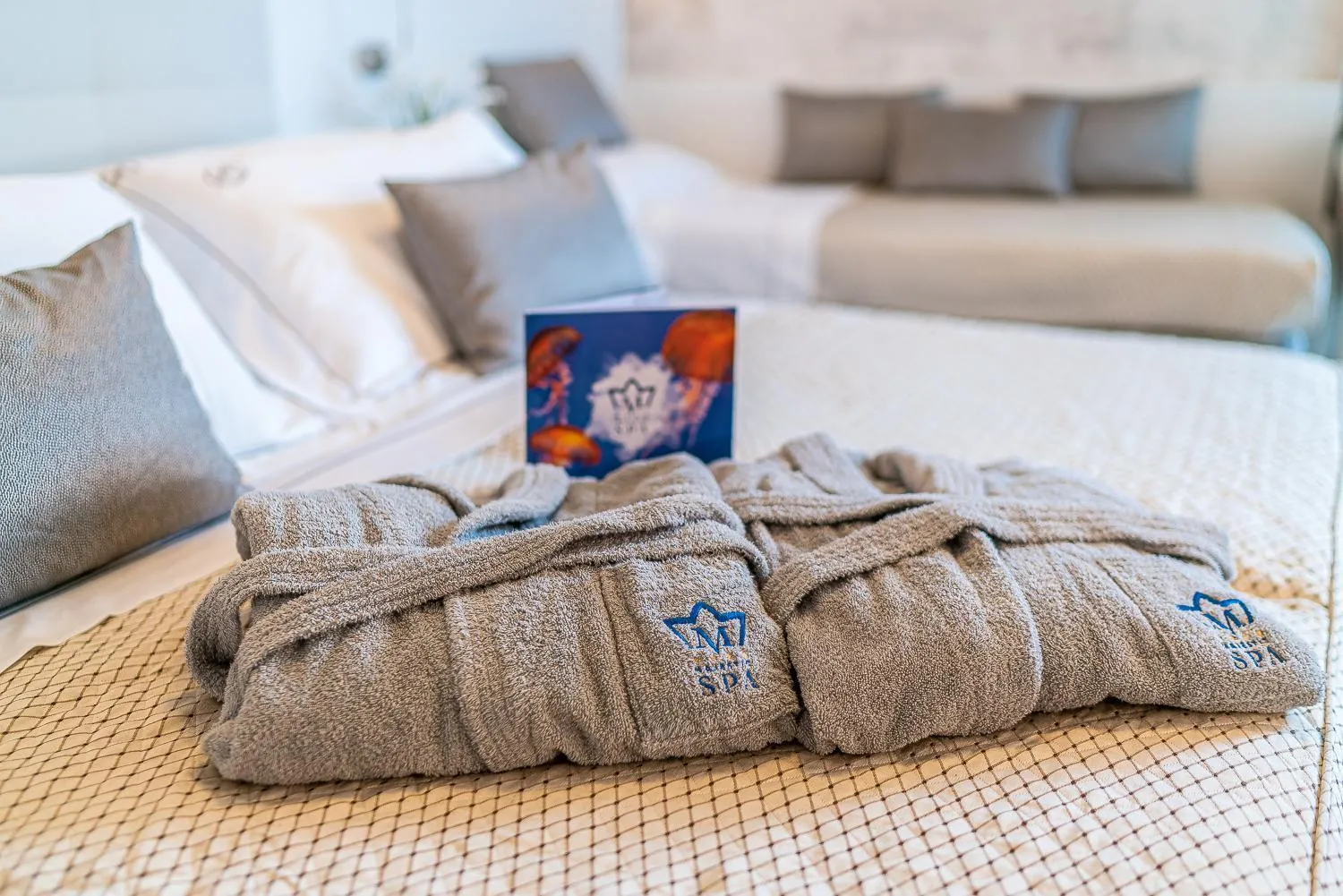 Bed in Majestic Beach Hotel & Wellness