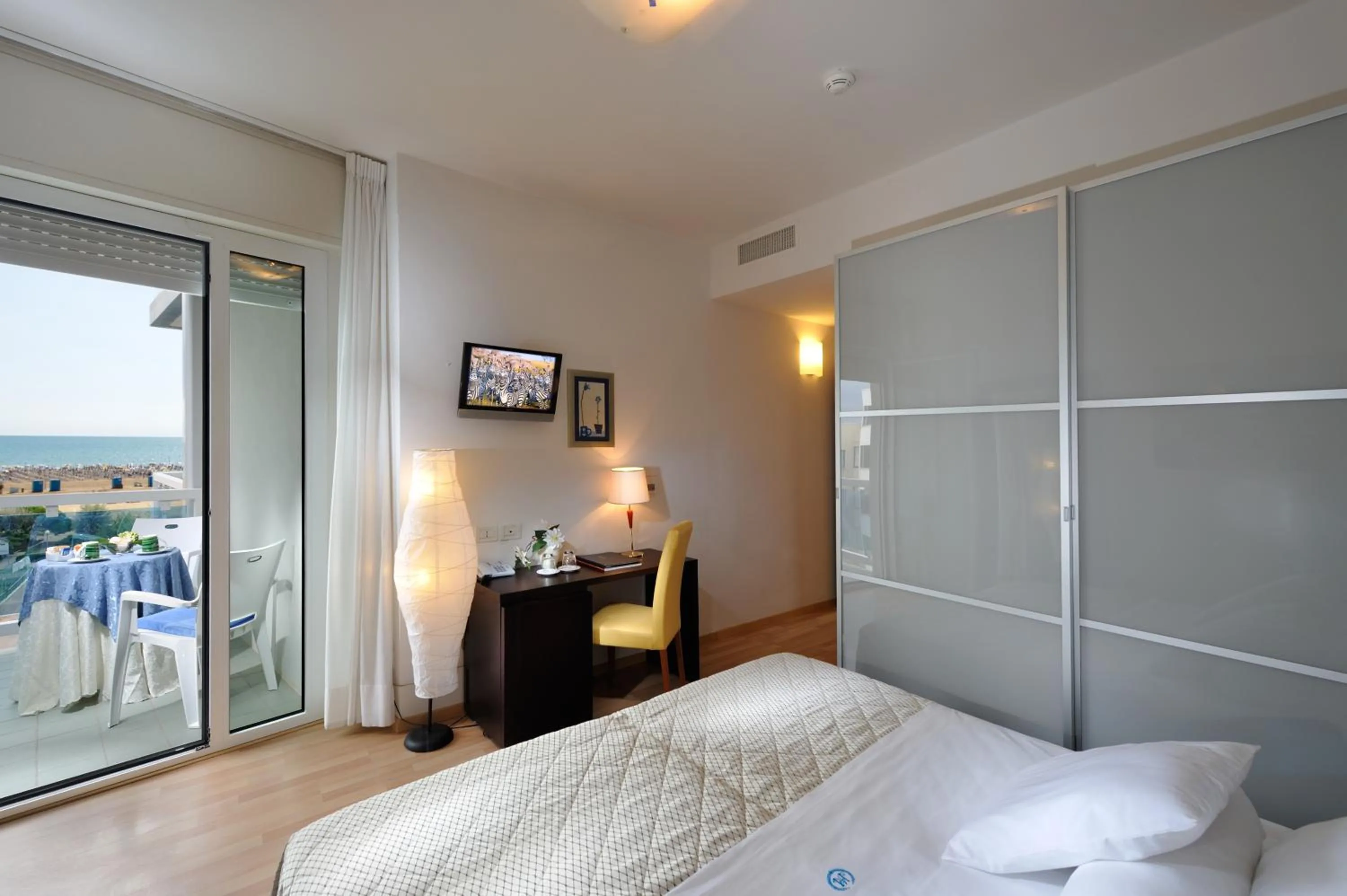 Bed in Majestic Beach Hotel & Wellness