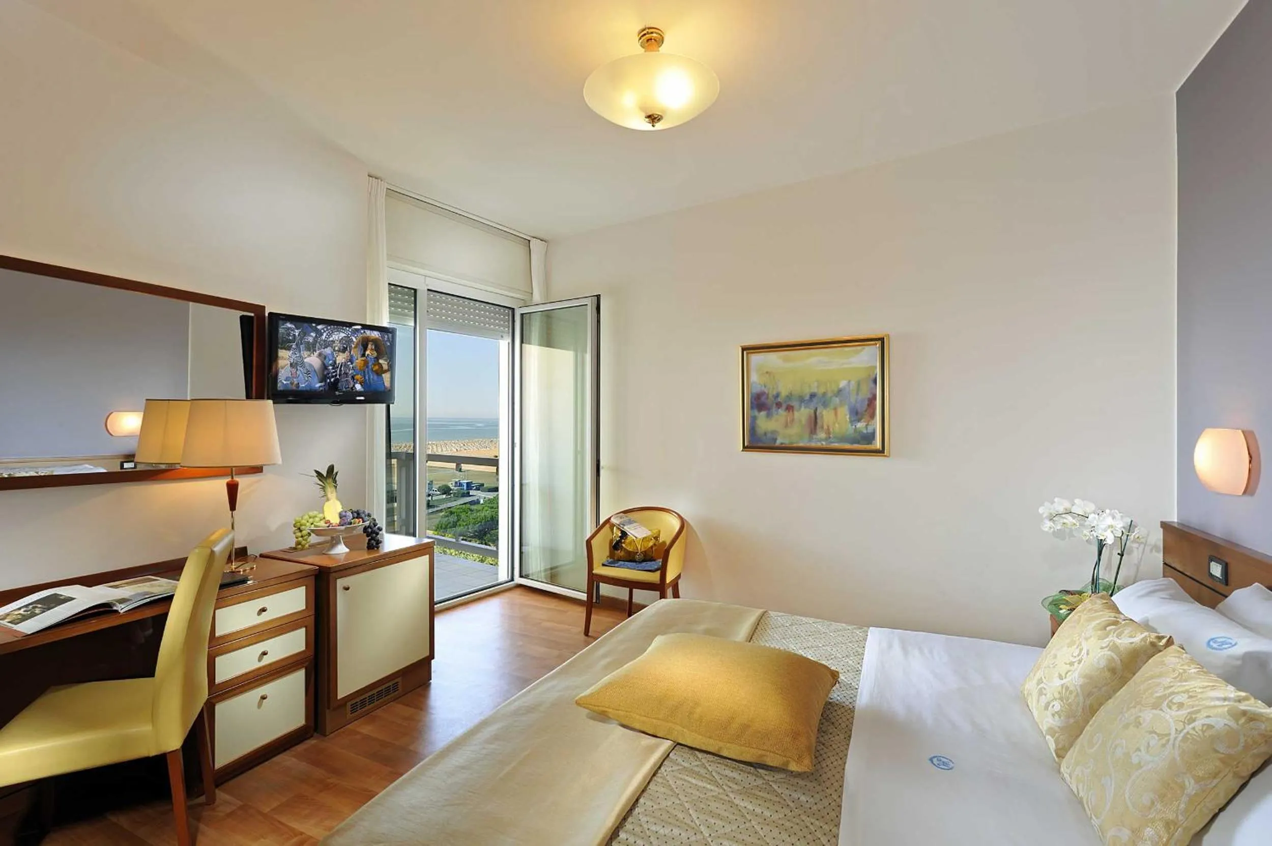 Bed in Majestic Beach Hotel & Wellness