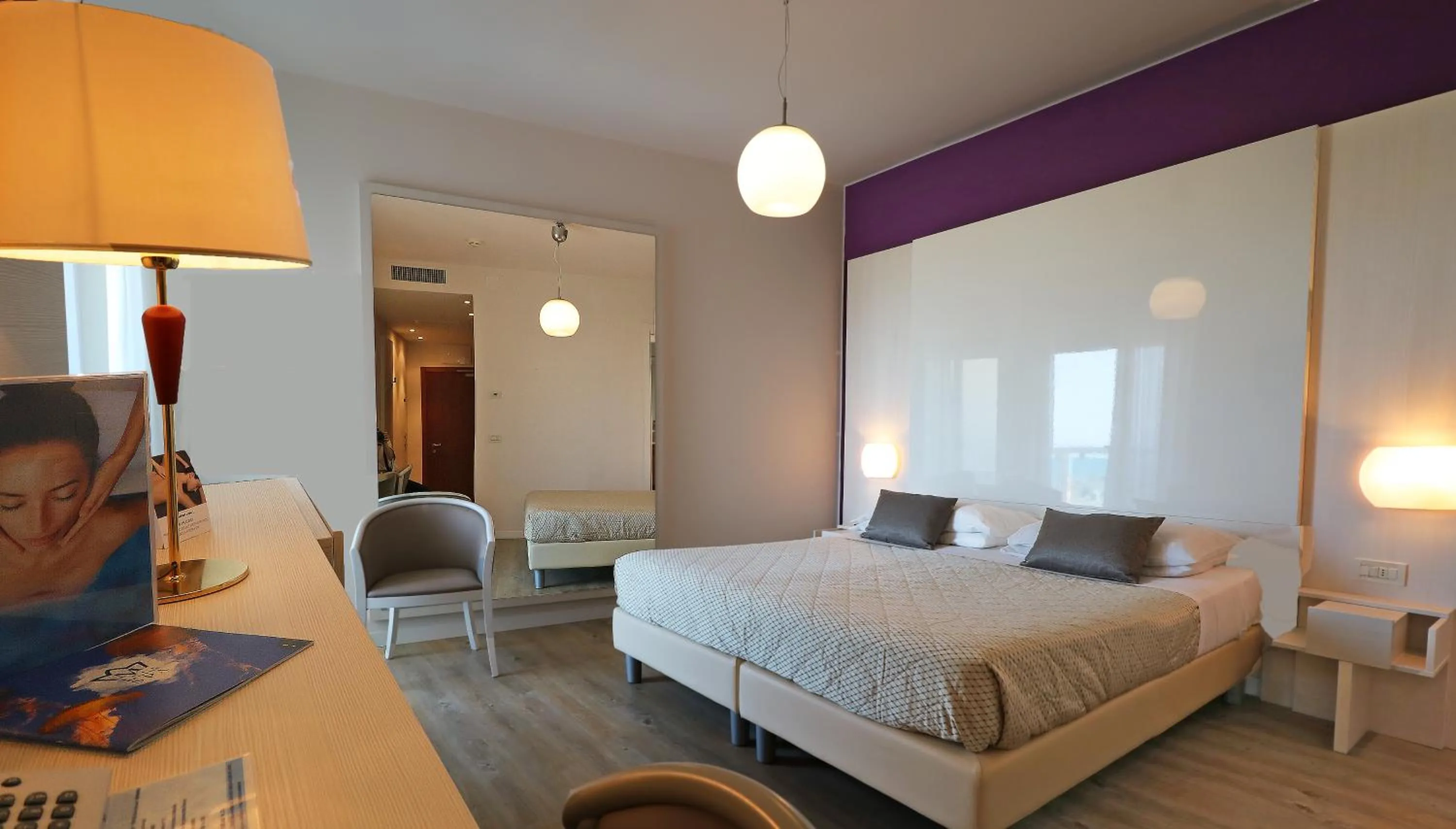 Bed in Majestic Beach Hotel & Wellness