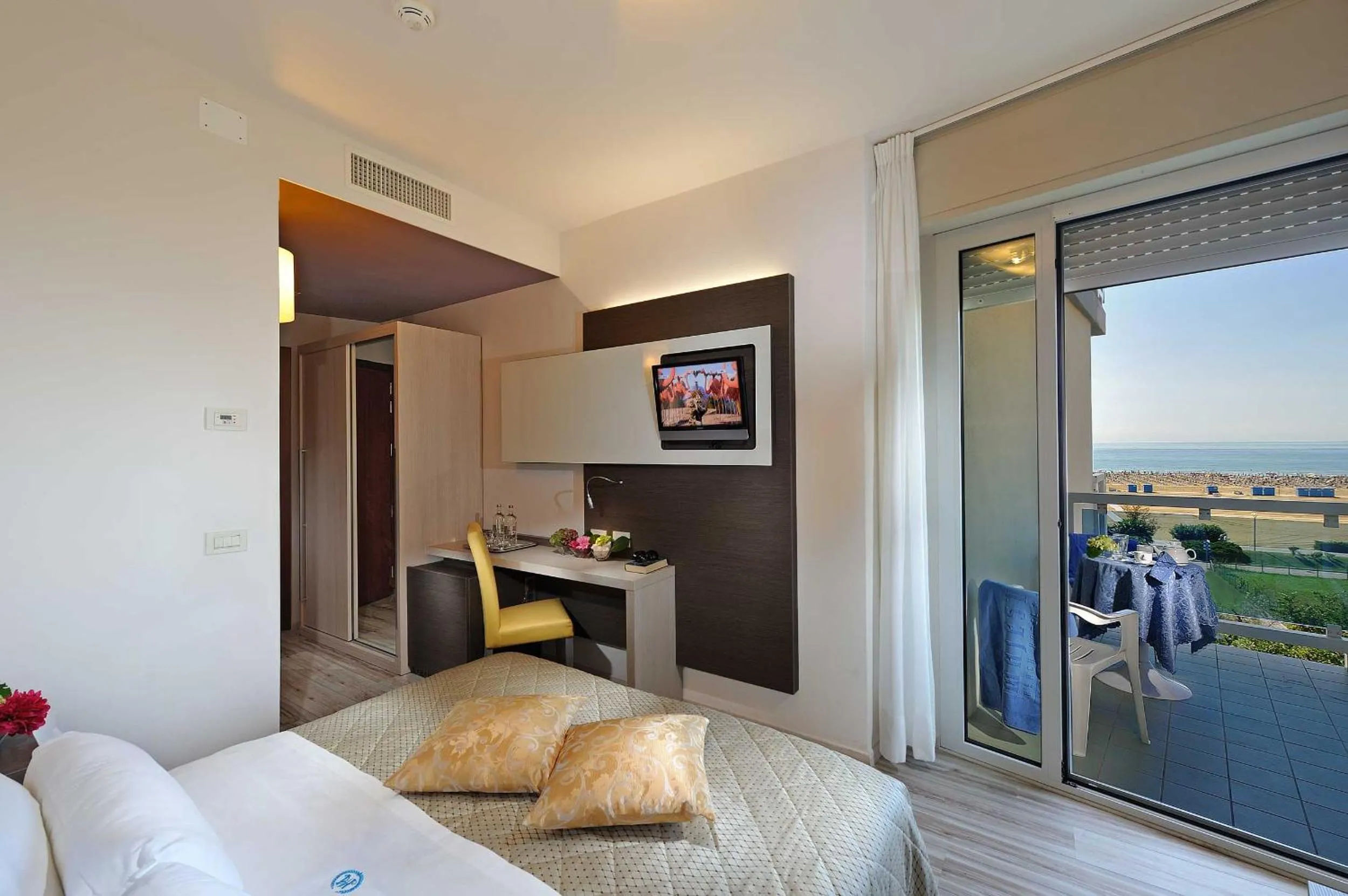 Bed in Majestic Beach Hotel & Wellness