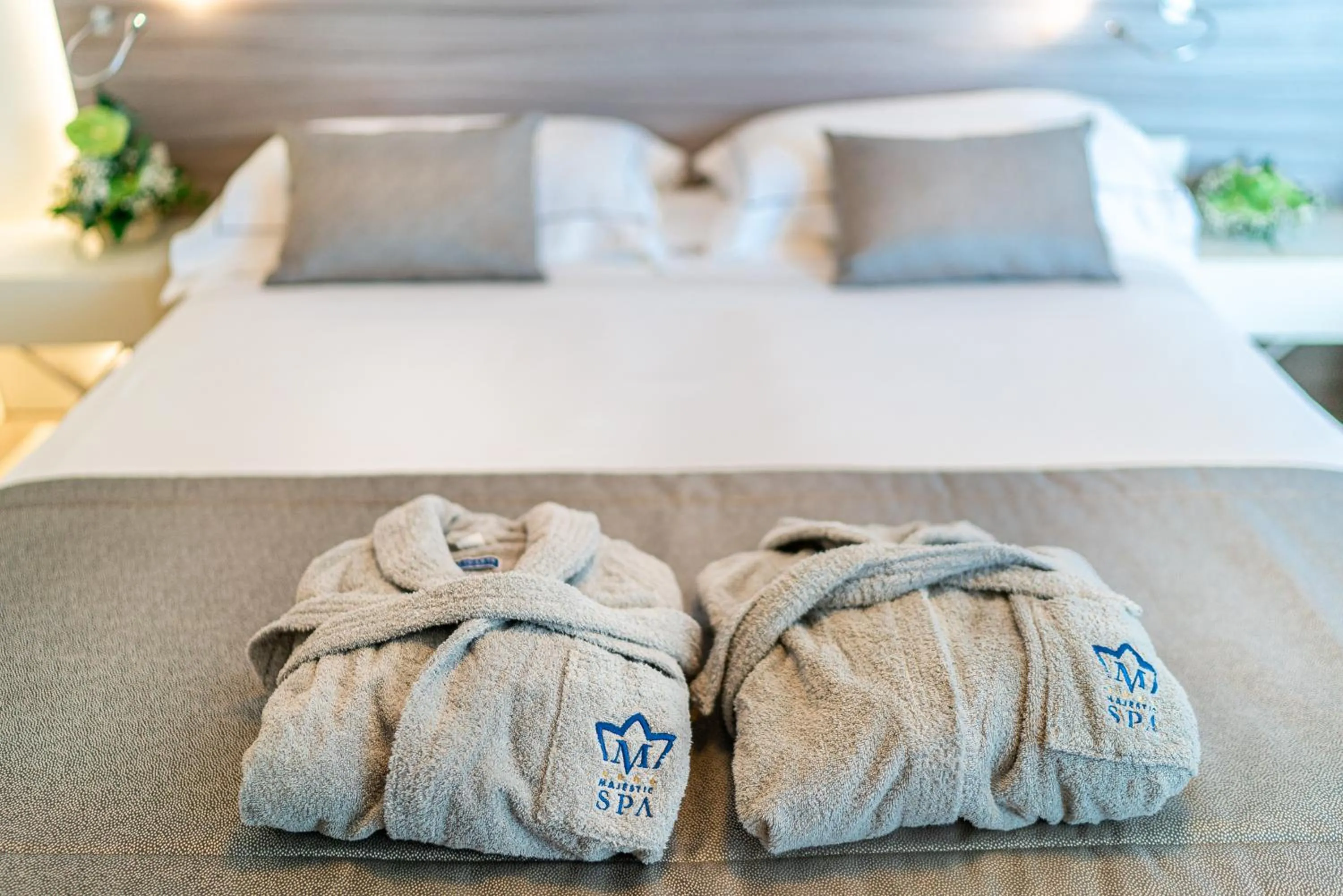 Bed in Majestic Beach Hotel & Wellness