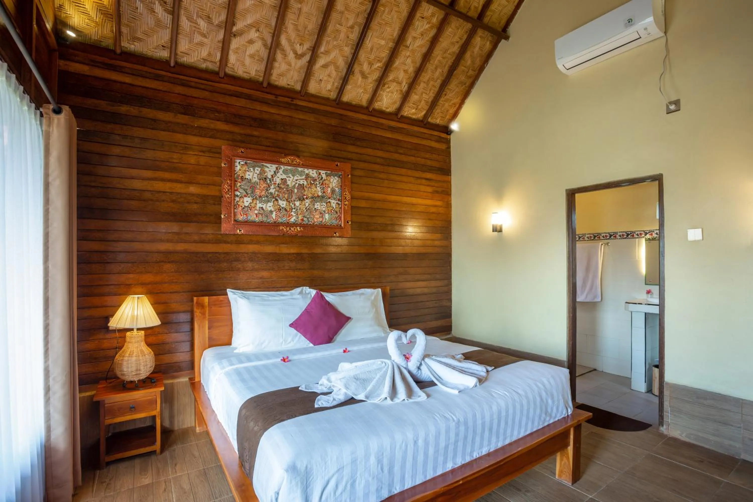 Bed in Rijet Villa Beach & Restaurant