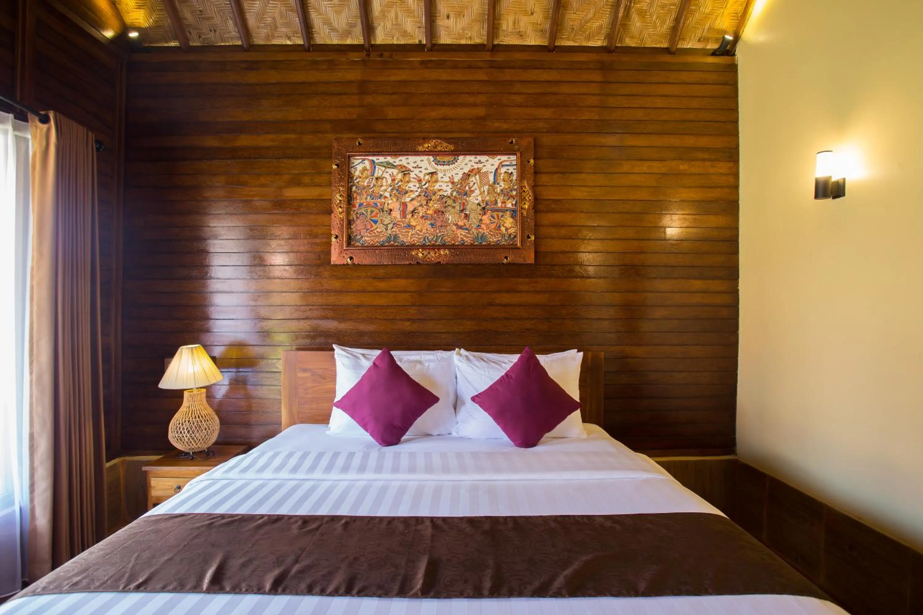 Bed in Rijet Villa Beach & Restaurant