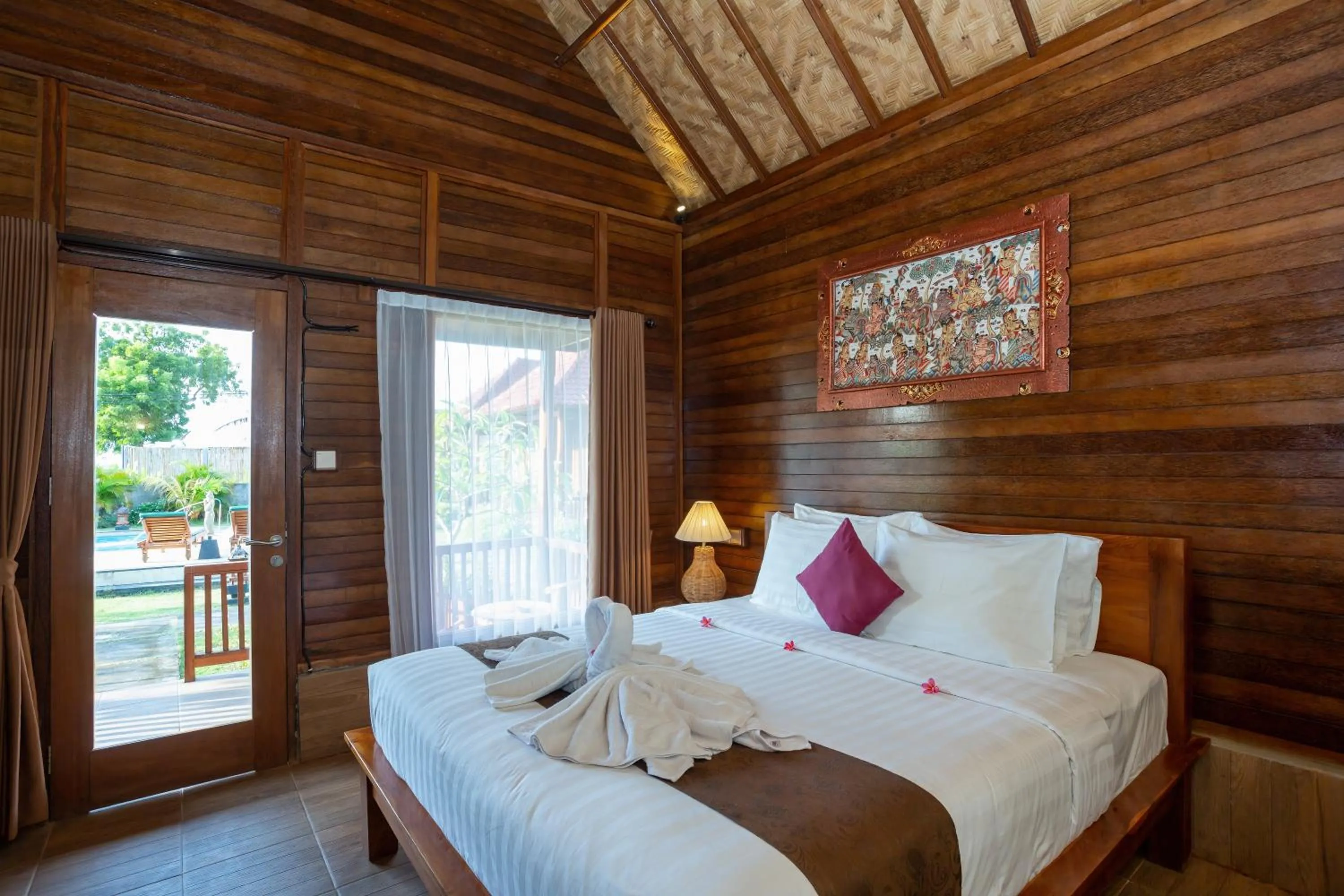 Bed in Rijet Villa Beach & Restaurant