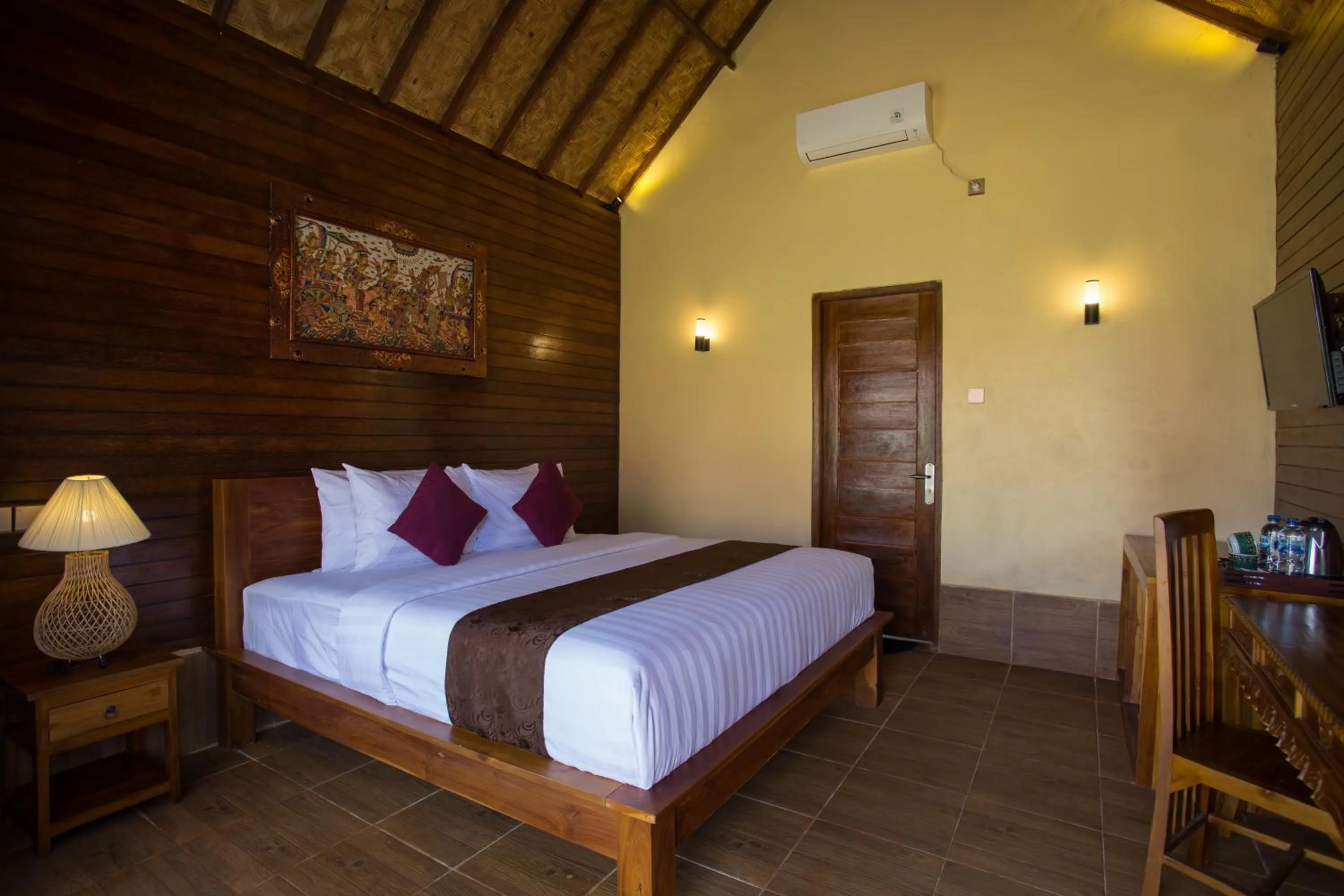 Bed in Rijet Villa Beach & Restaurant