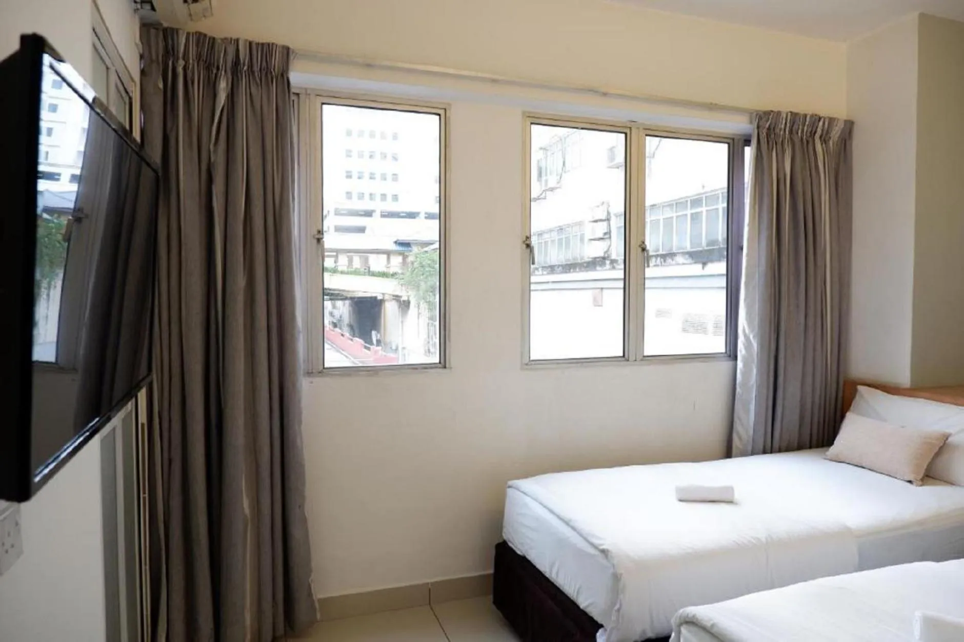 Photo of the whole room, Bed in Indah Garden Hotel