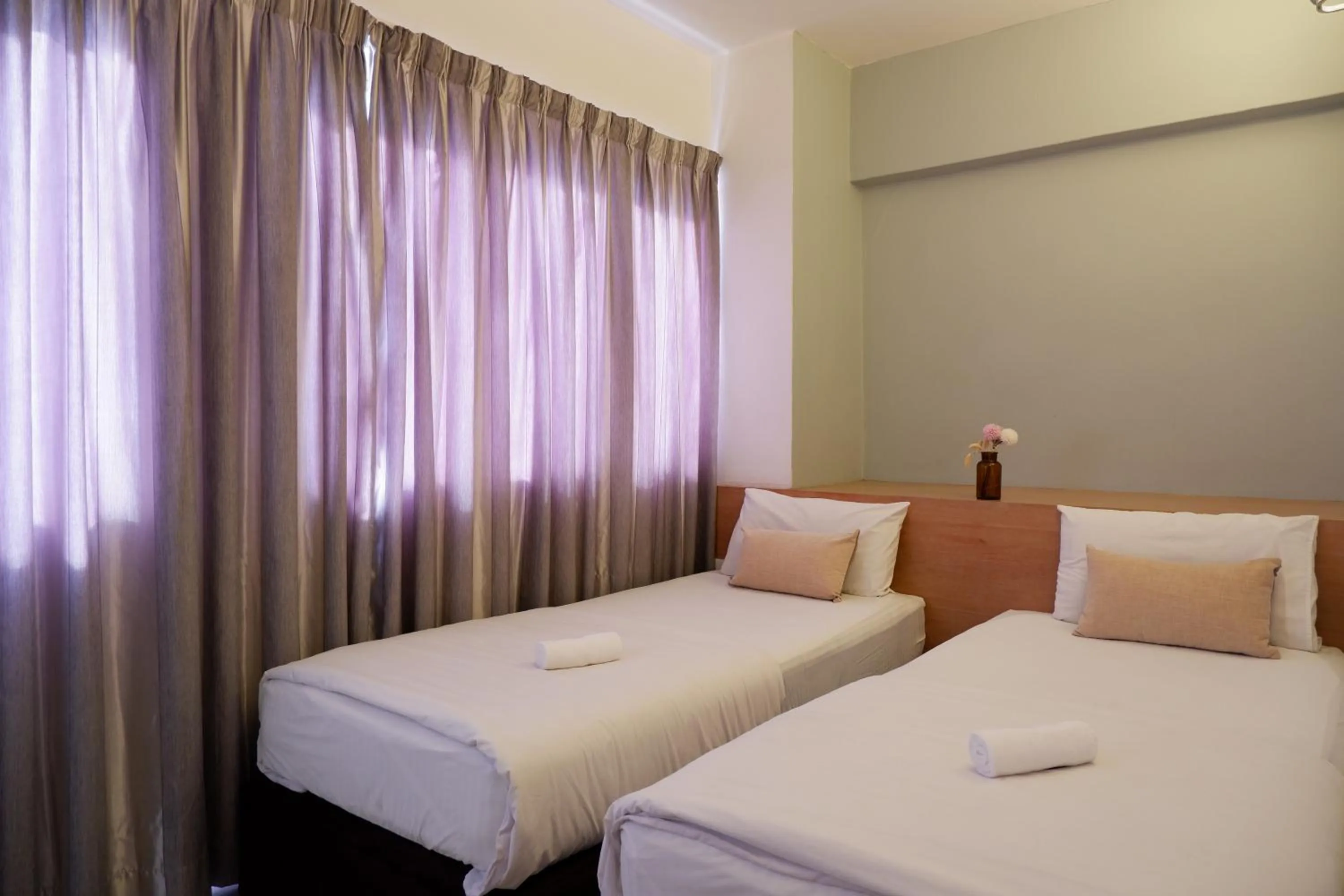 Bedroom, Bed in Indah Garden Hotel