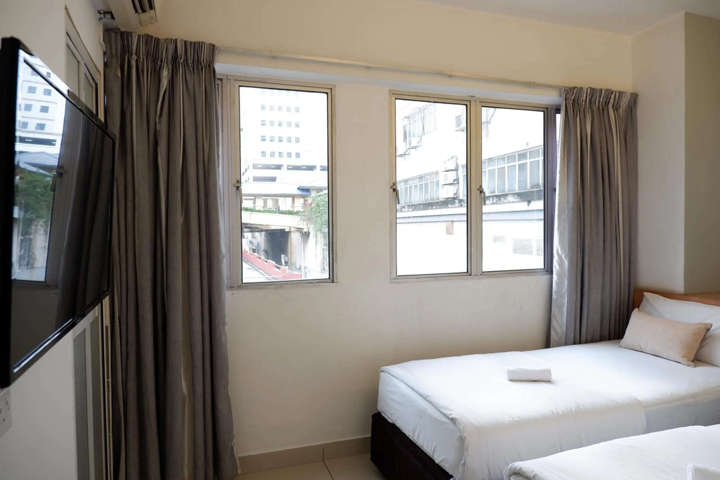 Bedroom, Bed in Indah Garden Hotel