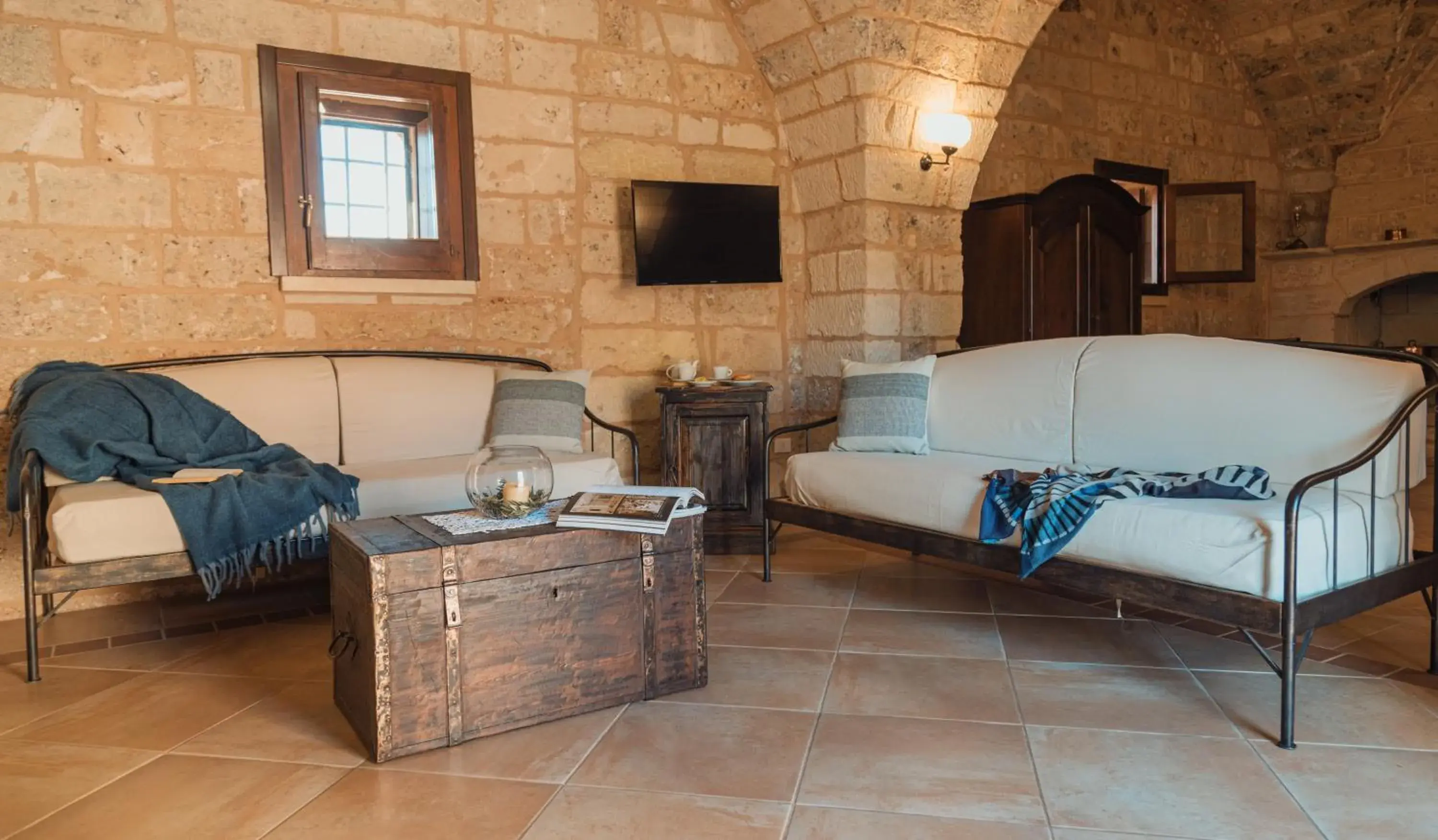 Living room in Tenuta Masseria & Spa Chicco Rizzo Living room in Tenuta Masseria & Spa Chicco Rizzo