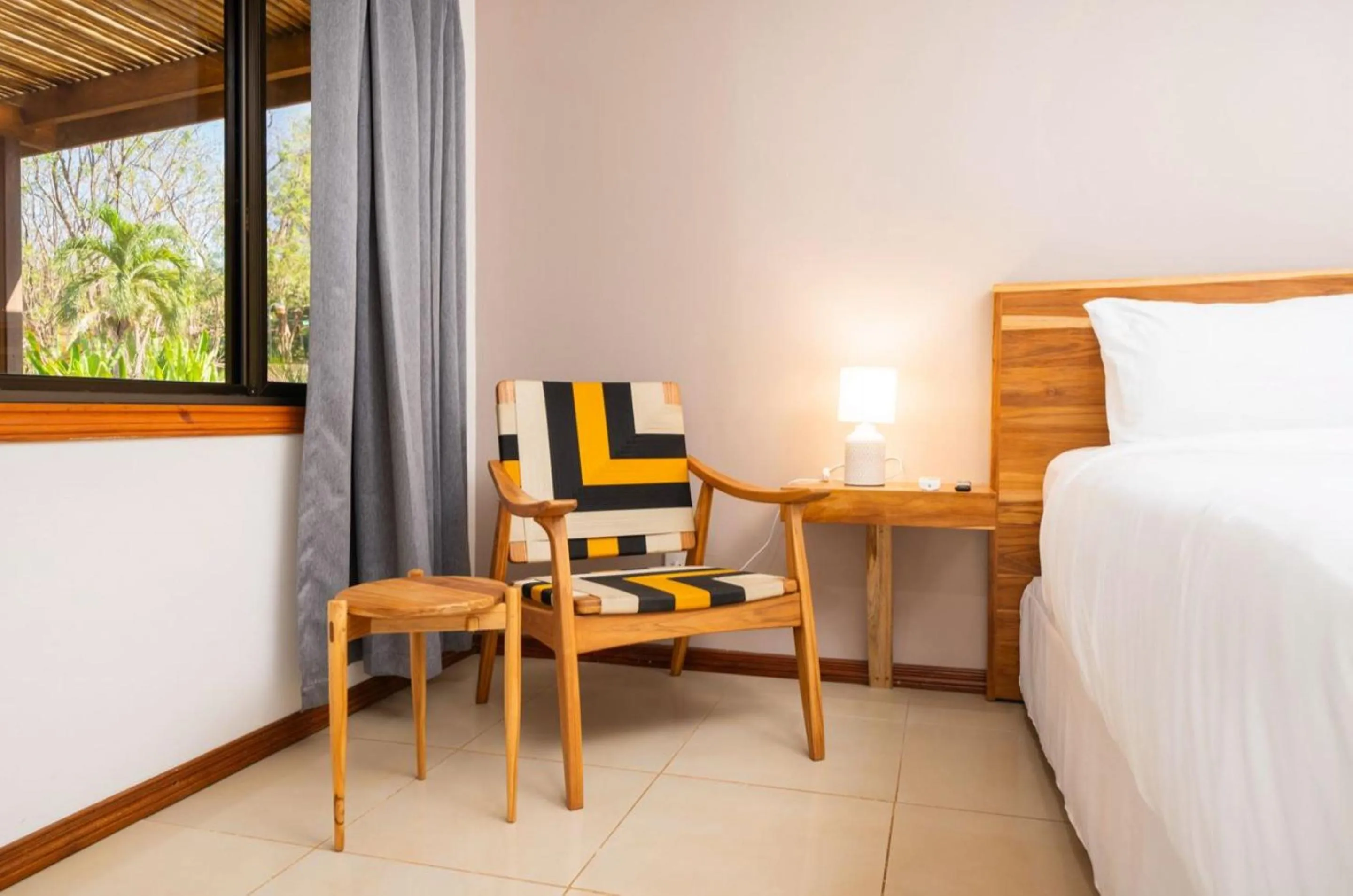 Seating area, Bed in Hotel Arco Iris