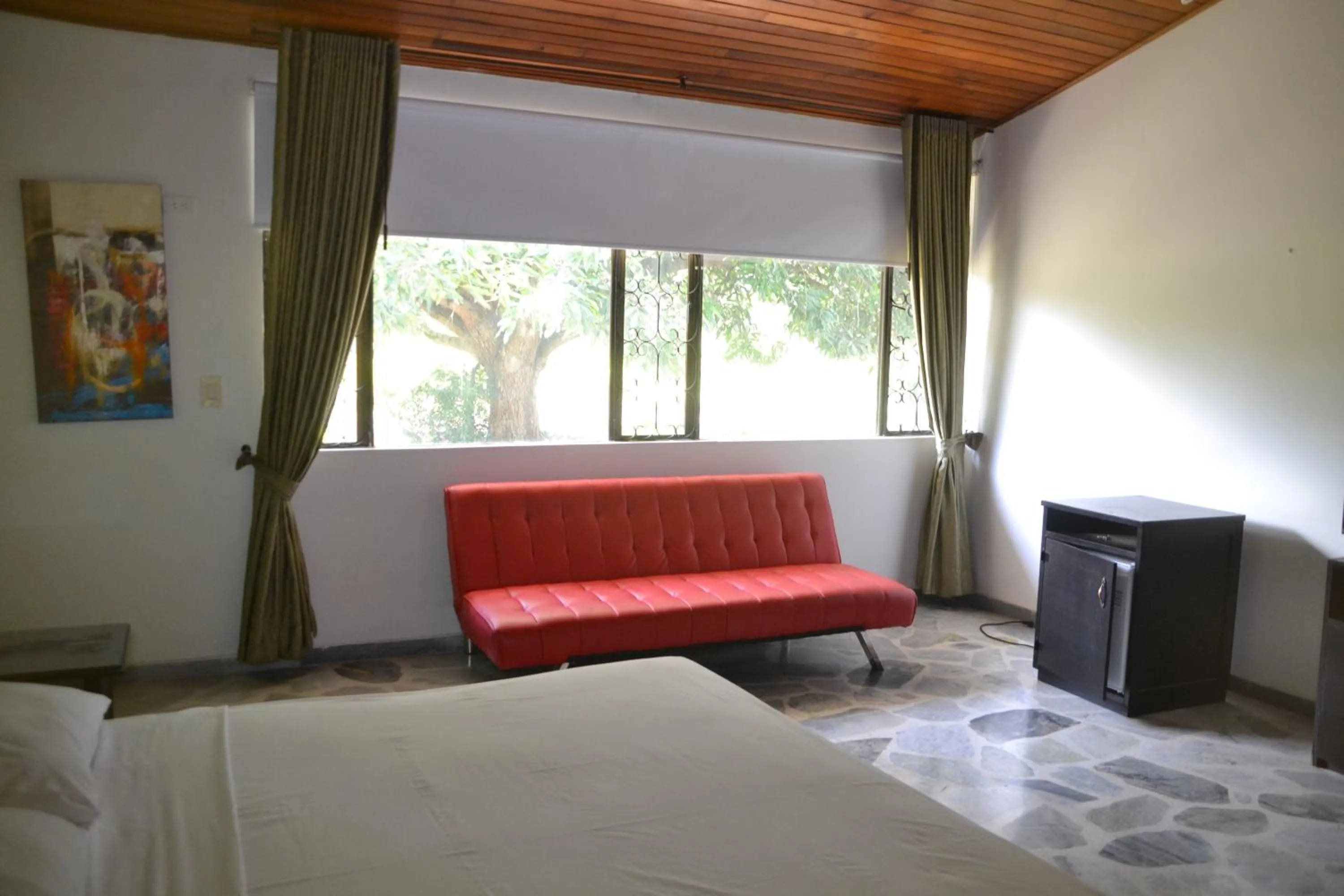 Seating area, Bed in Hotel Albatros