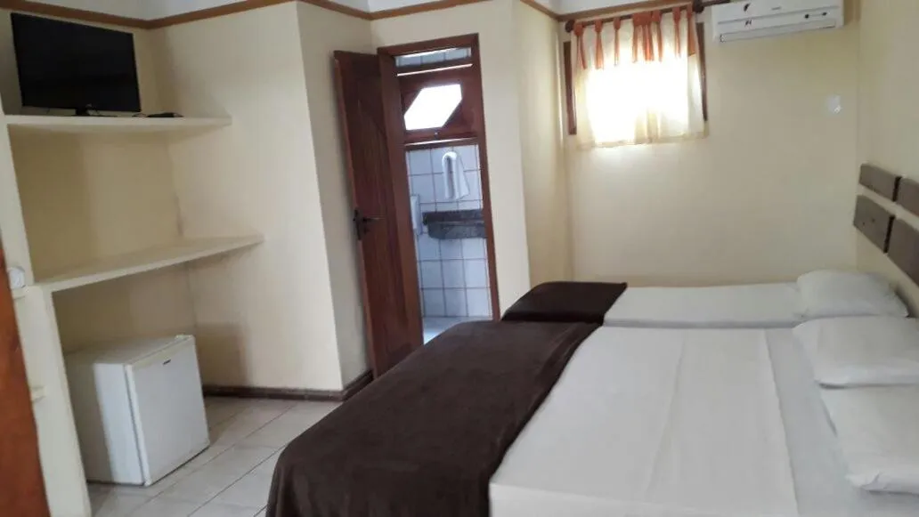 Bed in Coroa Bella Praia Hotel