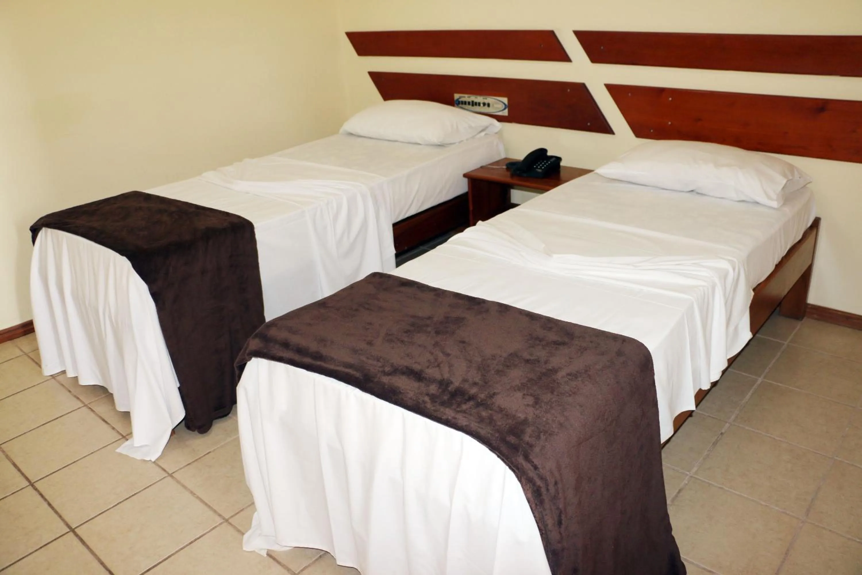 Bed in Coroa Bella Praia Hotel