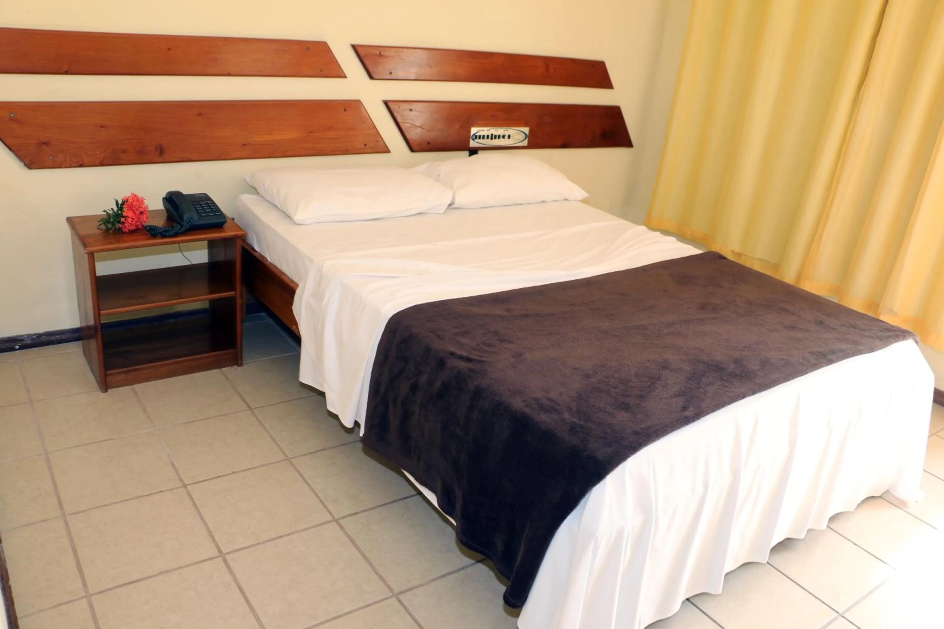 Bed in Coroa Bella Praia Hotel